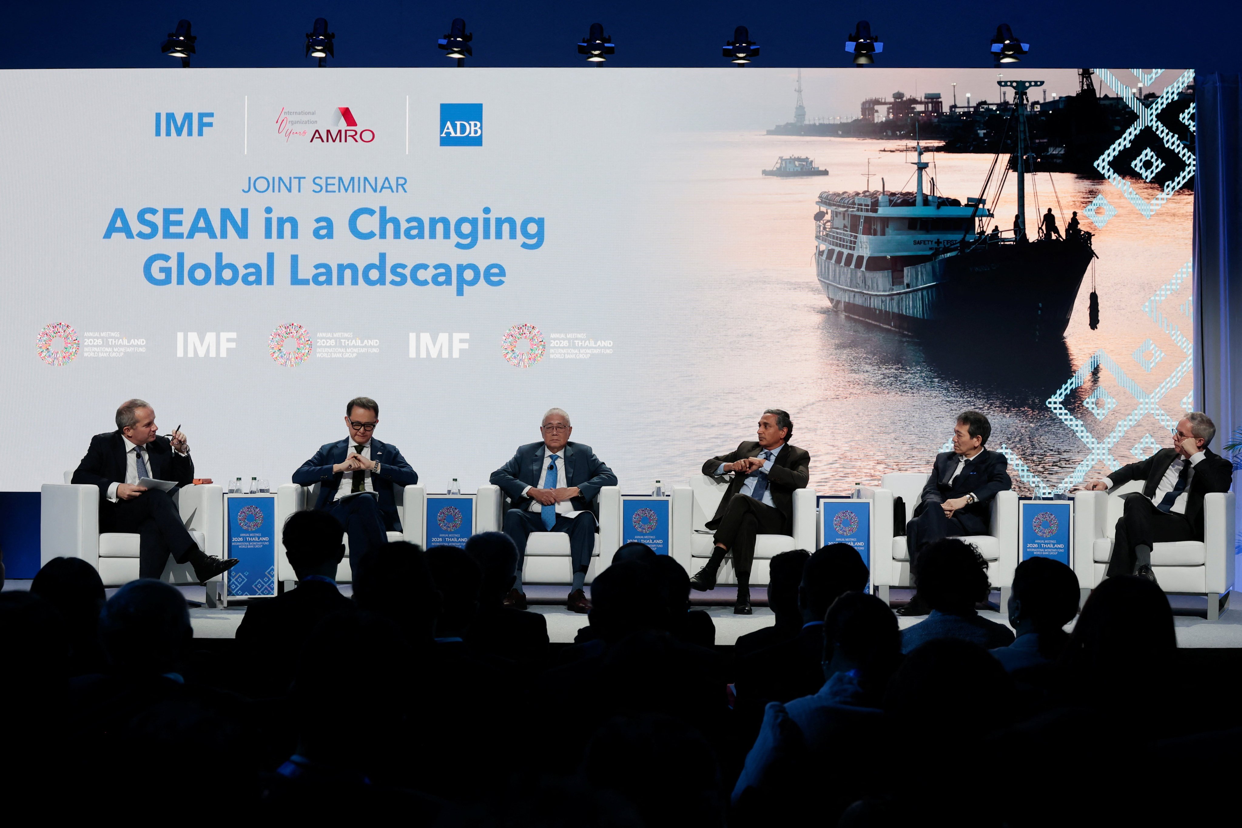Eli Remolona Jnr (centre), governor of the Philippine central bank, attends a panel discussion at the IMF/World Bank 2026 Annual Meetings in Bangkok on Wednesday. Photo: Reuters