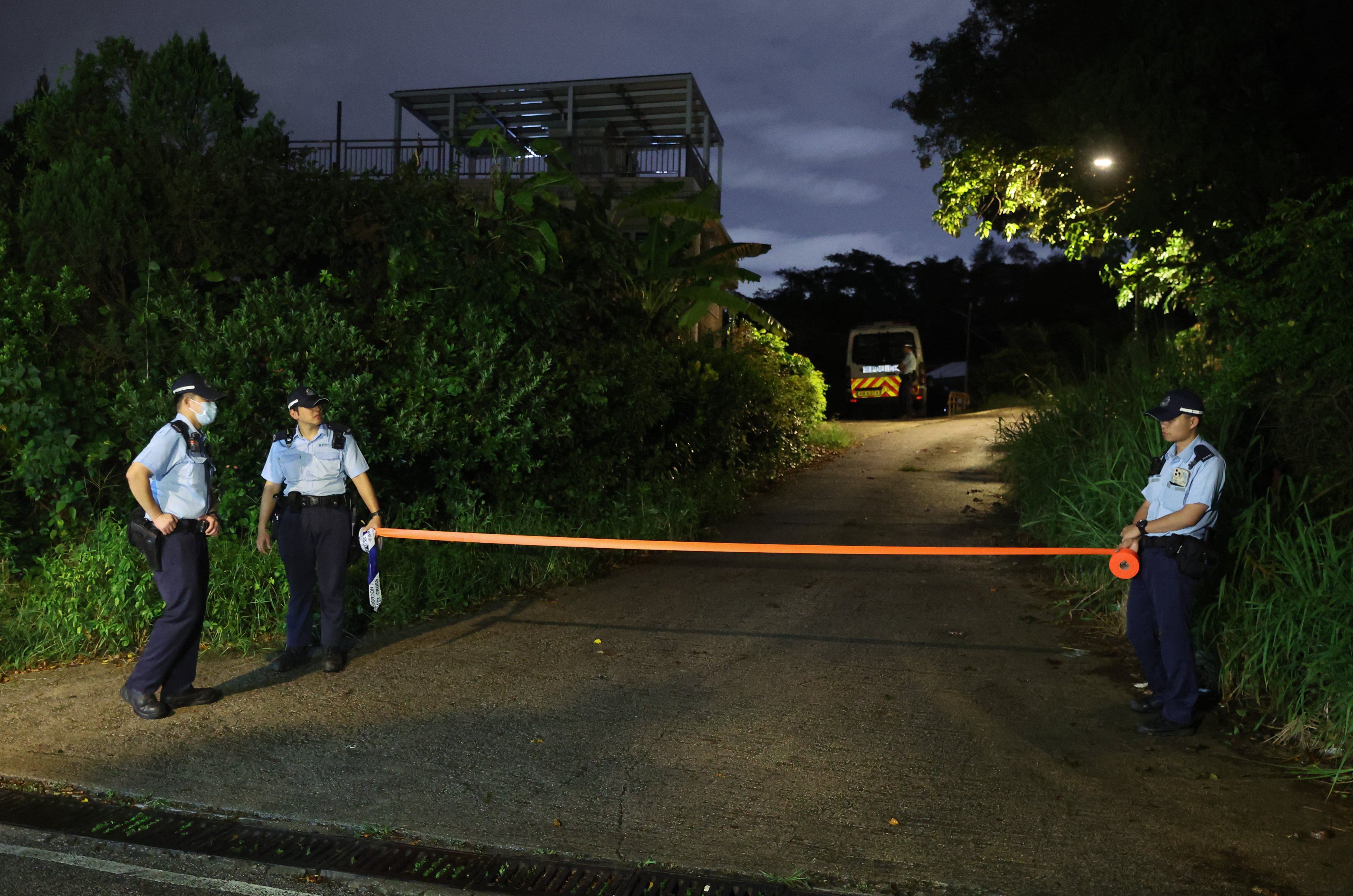 Police cordon off Pawsgate, a canine training centre in Ping Yeung Tsuen, Ta Kwu Ling, where 33-year-old Wong Cho-yee, who operated the facility, was found dead after being mauled by a dog. Photo: Edmond So