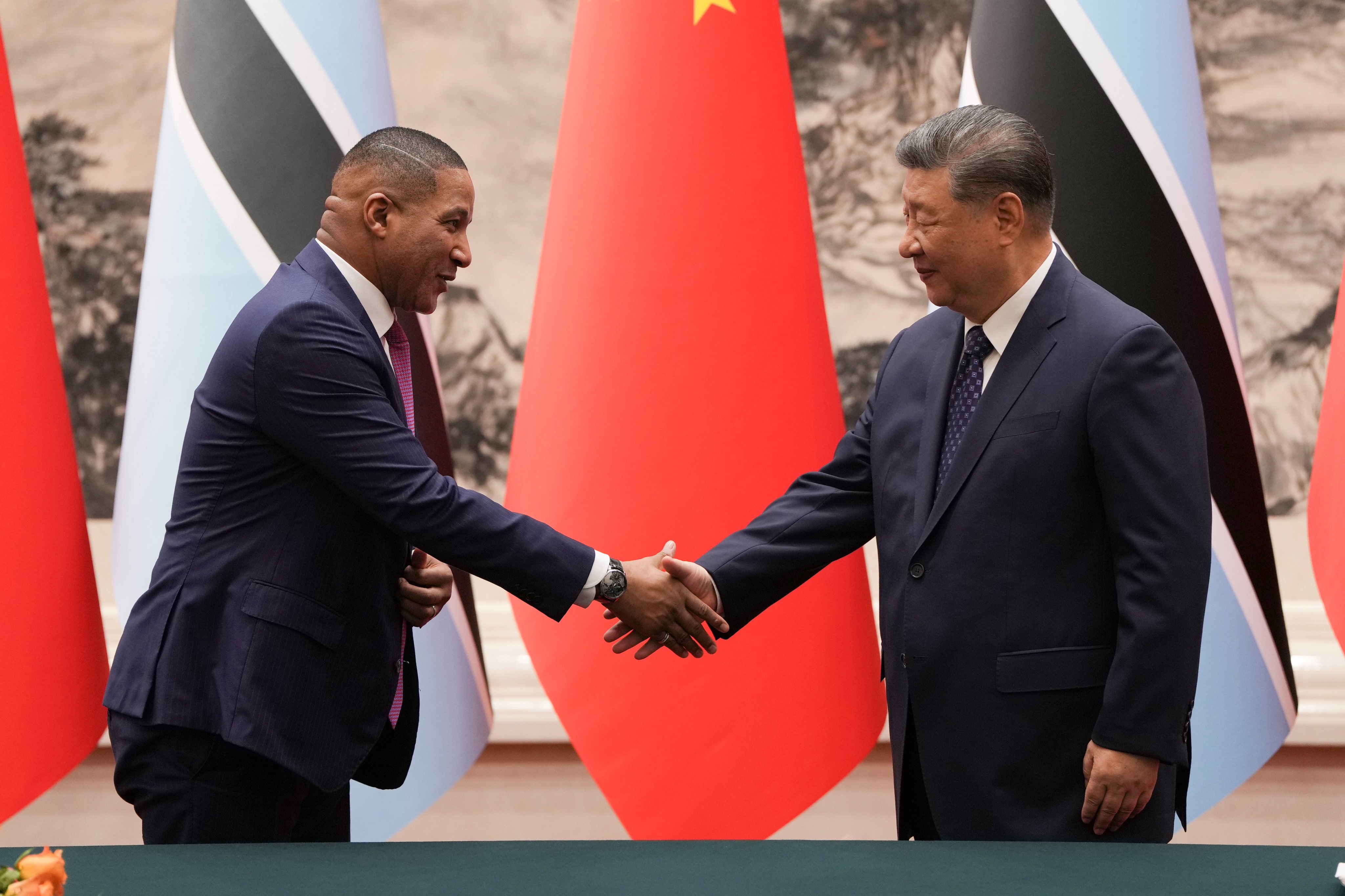 Chinese President Xi Jinping (right) and Botswanan President Duma Boko meet at the Great Hall of the People in Beijing on Tuesday. Photo: AP