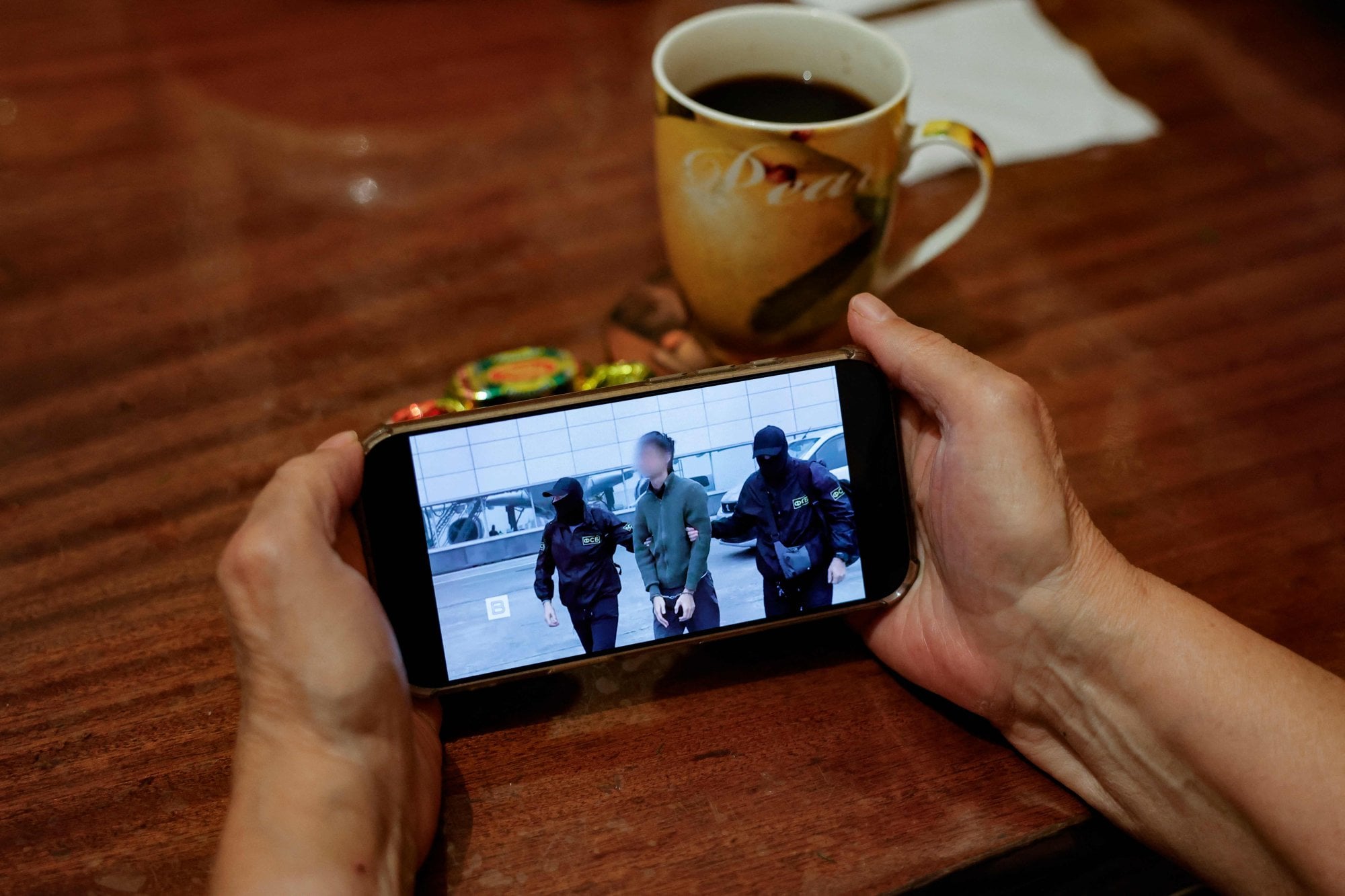 Footage of the Japanese journalist being detained. Photo: AFP Footage of the Japanese journalist being detained. Photo: AFP