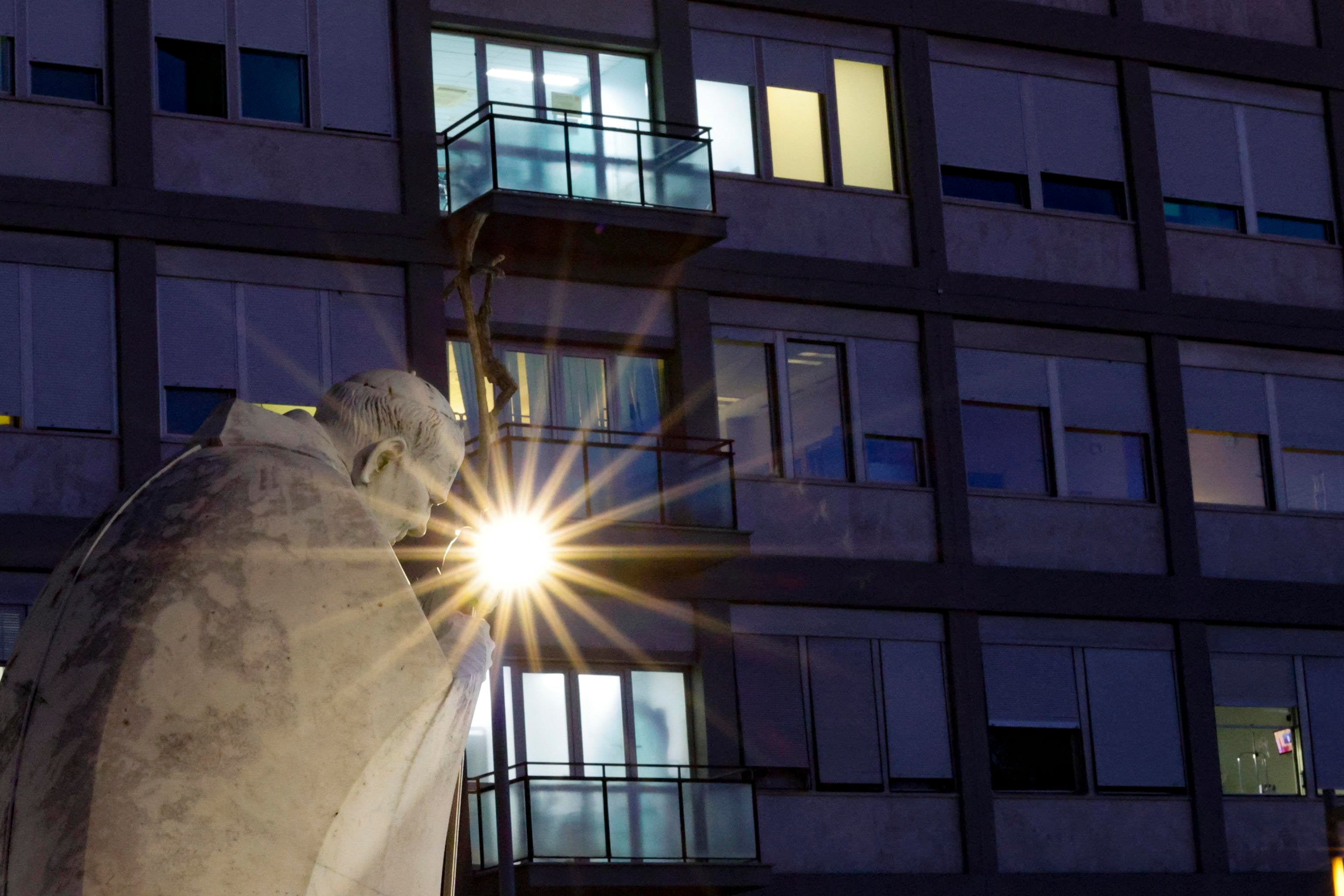 The statue of Pope John Paul II stands outside Agostino Gemelli Hospital in Rome, Italy, on Tuesday. Photo: EPA