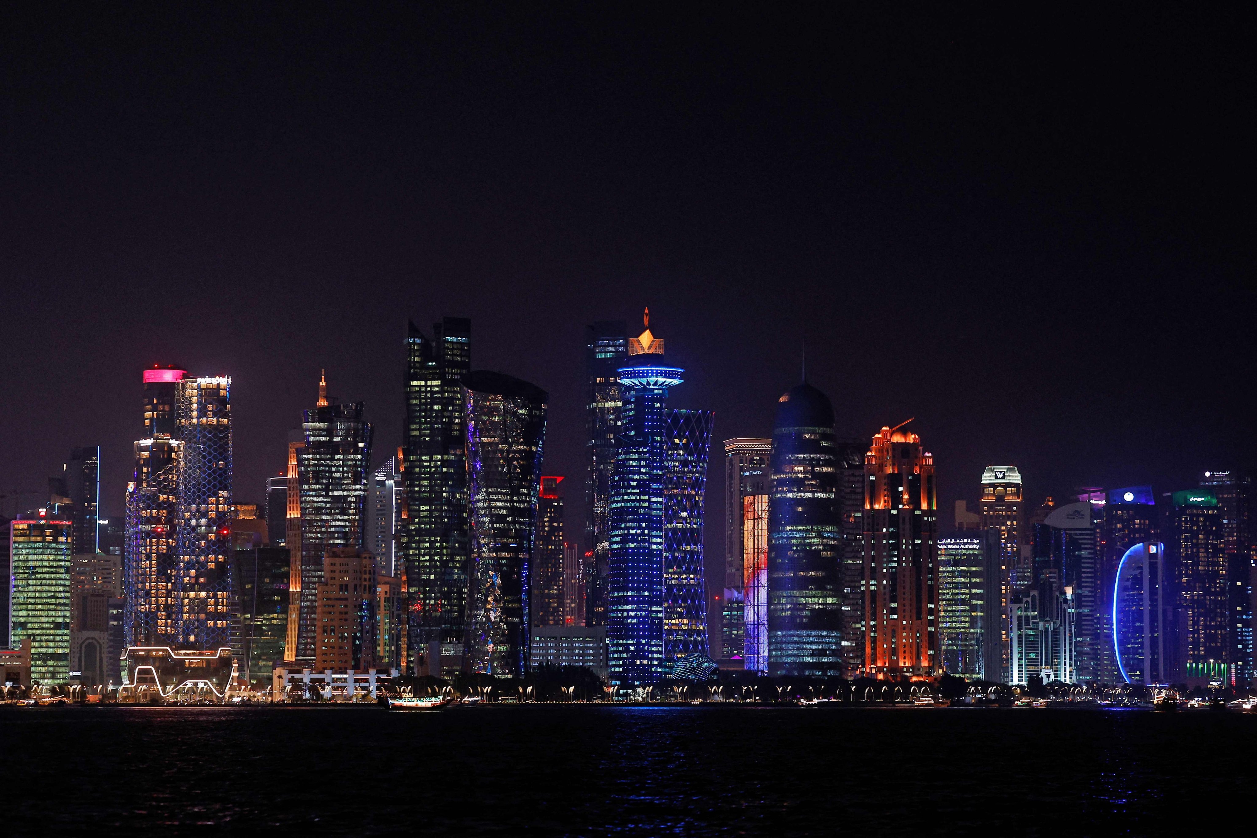 The Corniche promenade and illuminated high-rise buildings are pictured in Doha, capital of Qatar, on October 11. Photo: AFP
