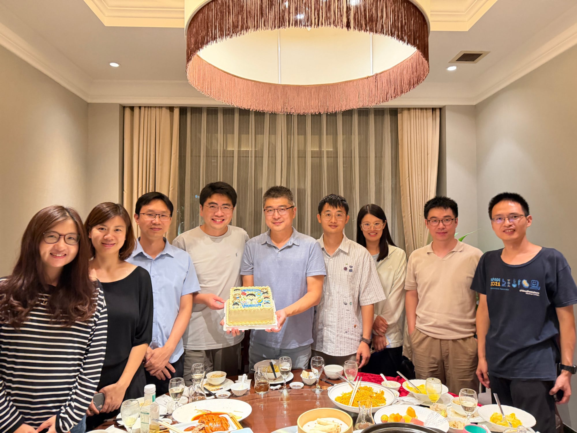Wu Jun is pictured with his former postdoctoral students in Hangzhou. Photo: Handout Wu Jun is pictured with his former postdoctoral students in Hangzhou. Photo: Handout