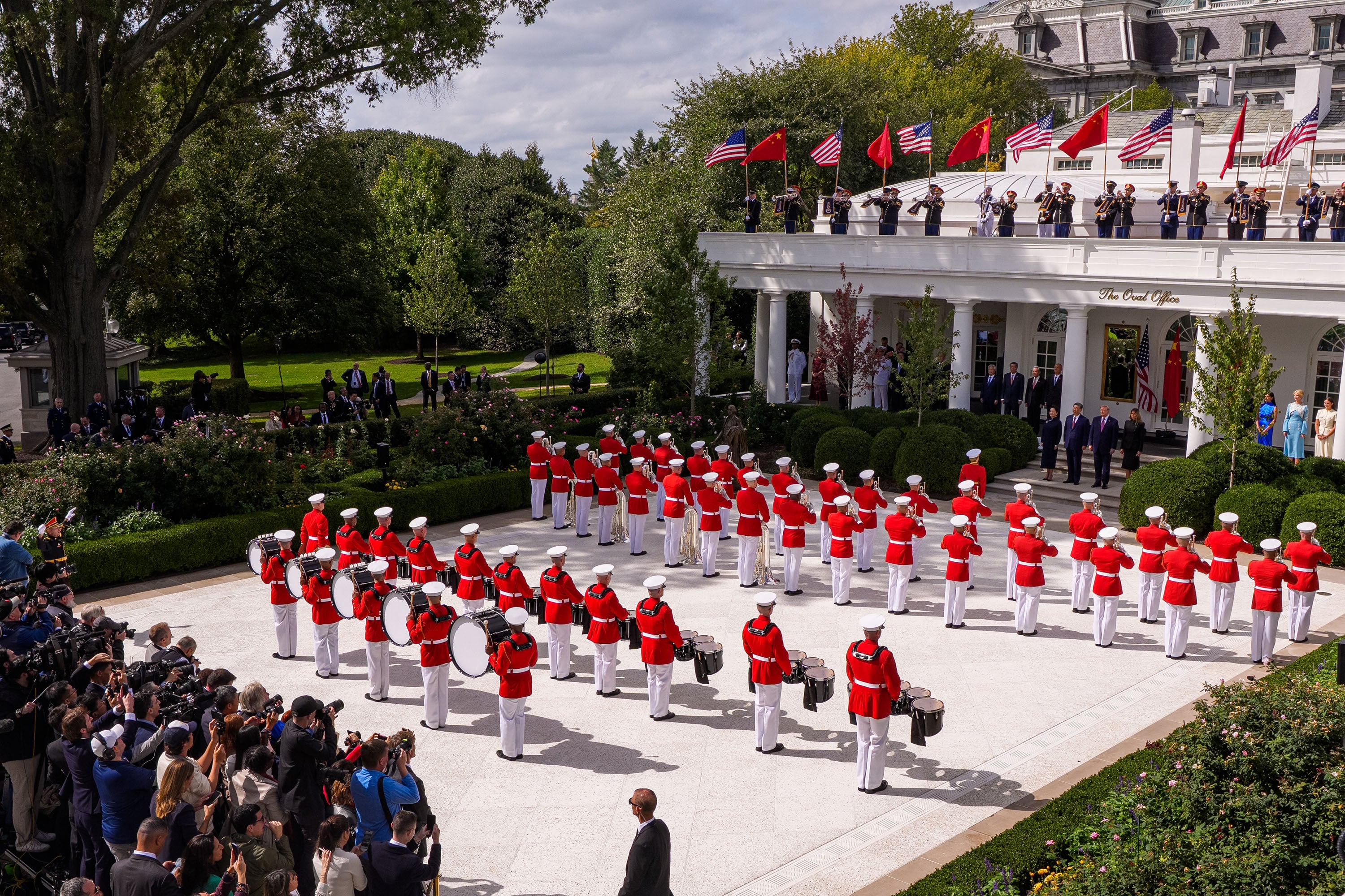 China’s first lady Peng Liyuan, President Xi Jinping, US President Donald Trump and first lady Melania Trump watch a military review in the Rose Garden of the White House in Washington on September 24. Photo: Getty Images