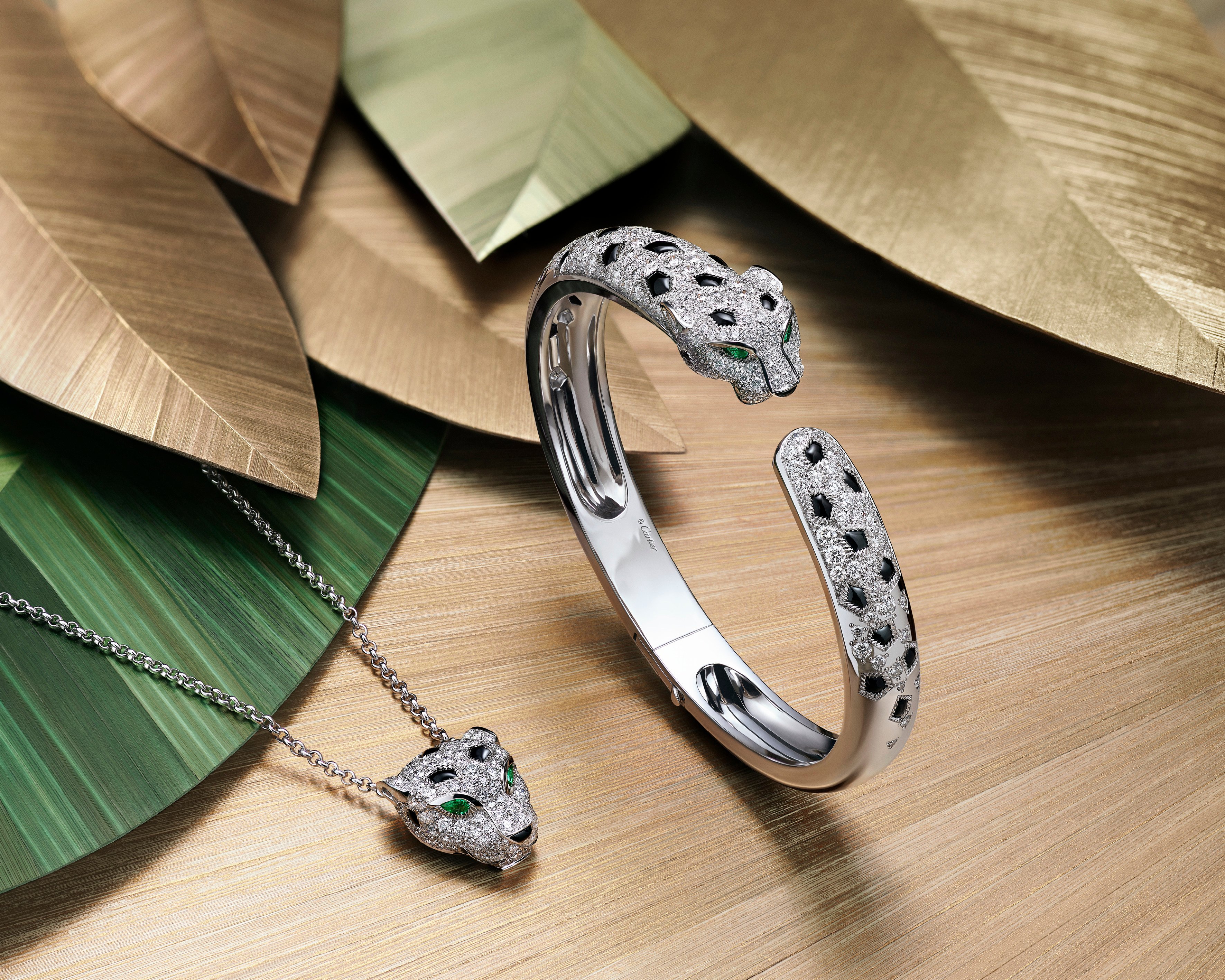 Panthère de Cartier necklace and bracelet in white gold from the Cartier Into the Wild collection. Photo: Handout