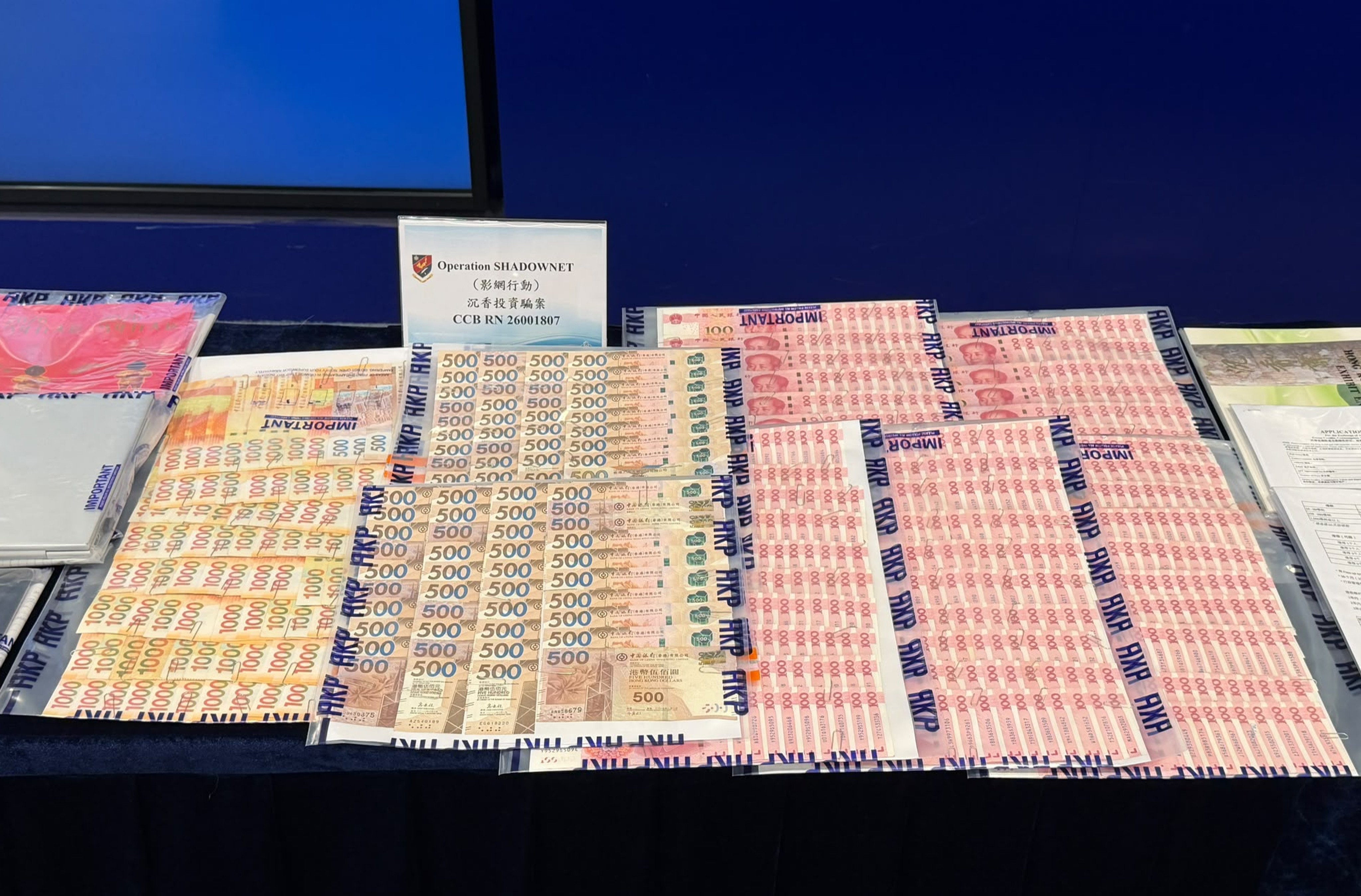 Money seized during a police raid on the BBB Group's premises. The company had claimed to run multiple large agarwood plantations in Malaysia. Photo: handout