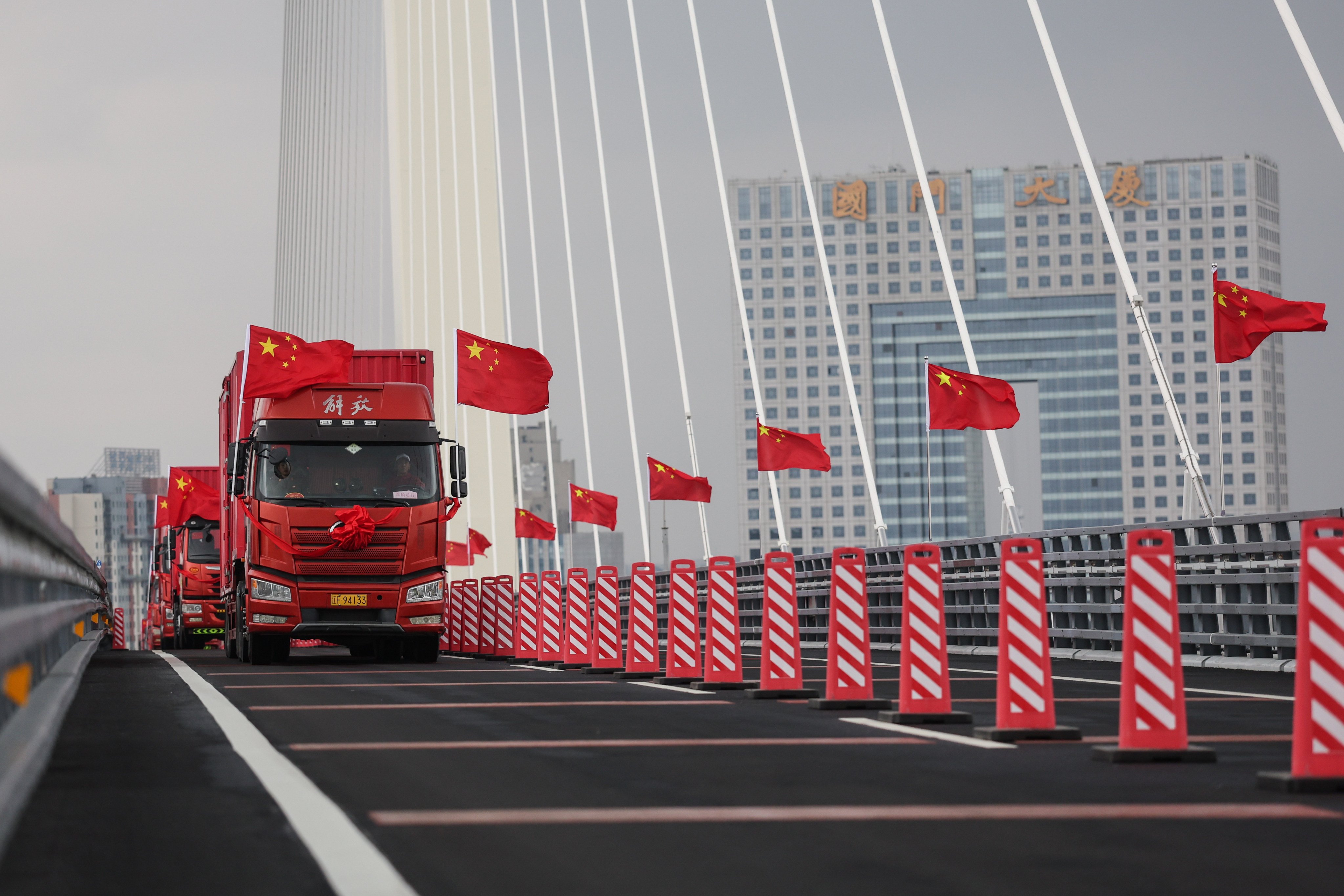 A truck travels across the New Yalu River Bridge connecting China and North Korea on Thursday. Photo: Xinhua