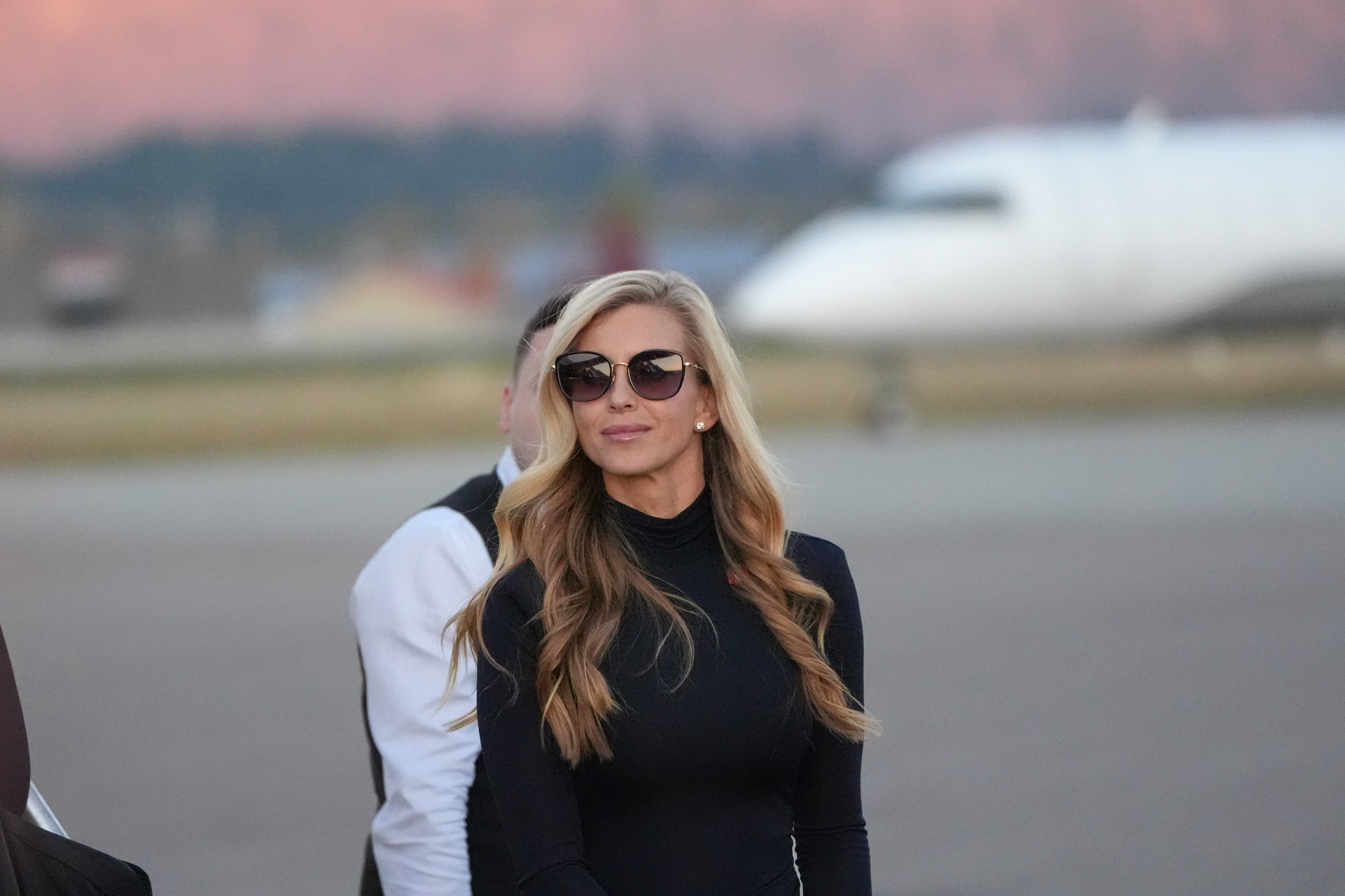 White House press secretary Katie Zacharia arrives at Glacier Park International Airport in Kalispell, Montana, on Wednesday. Photo: AP