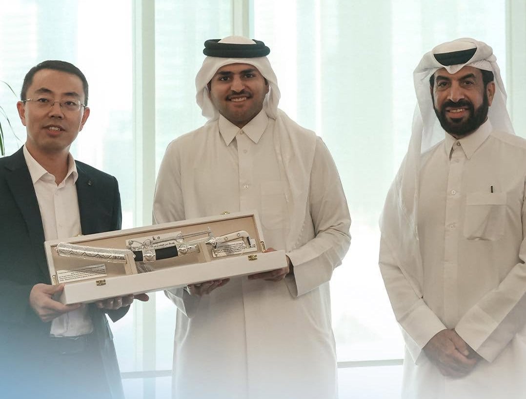 Representatives from China Railway Tunnel Group and the Qatari firm Advanced Pipes and Casts Co pose for a photo after agreeing to collaborate on coming tunnel projects. Photo: Handout
