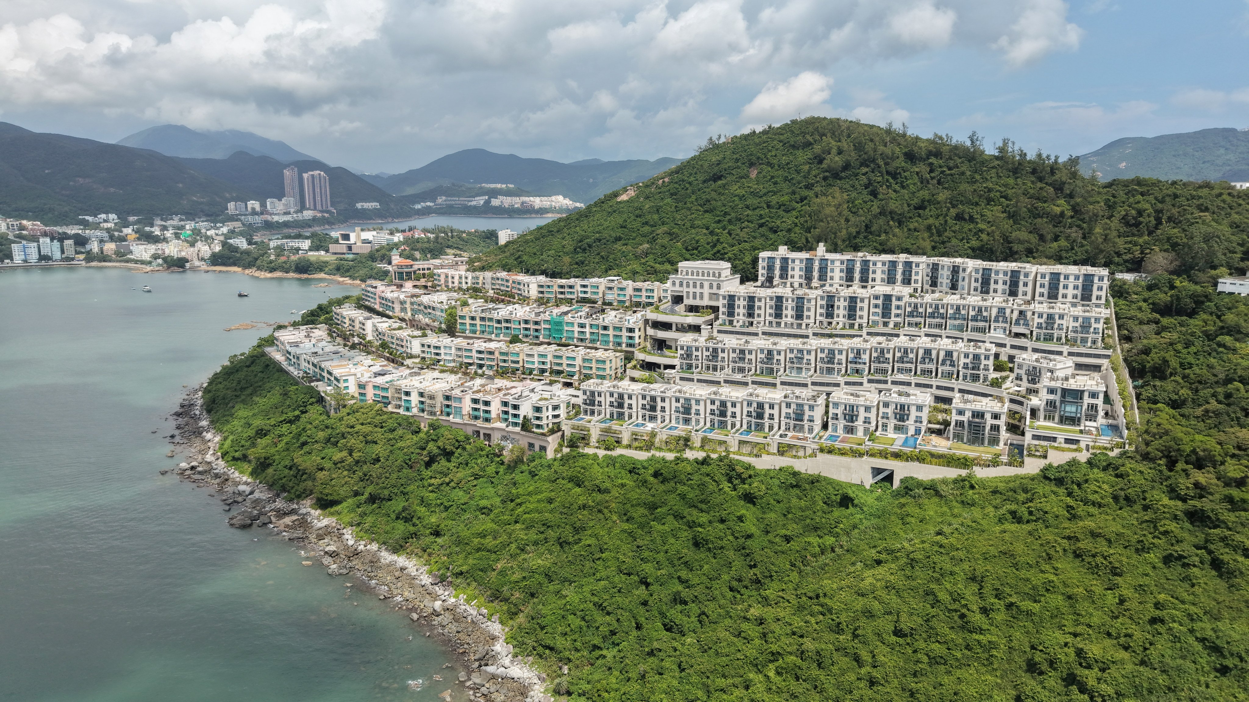 The development comprises 32 detached houses and 11 low-rise blocks containing 50 flats in total. Photo: Elson Li