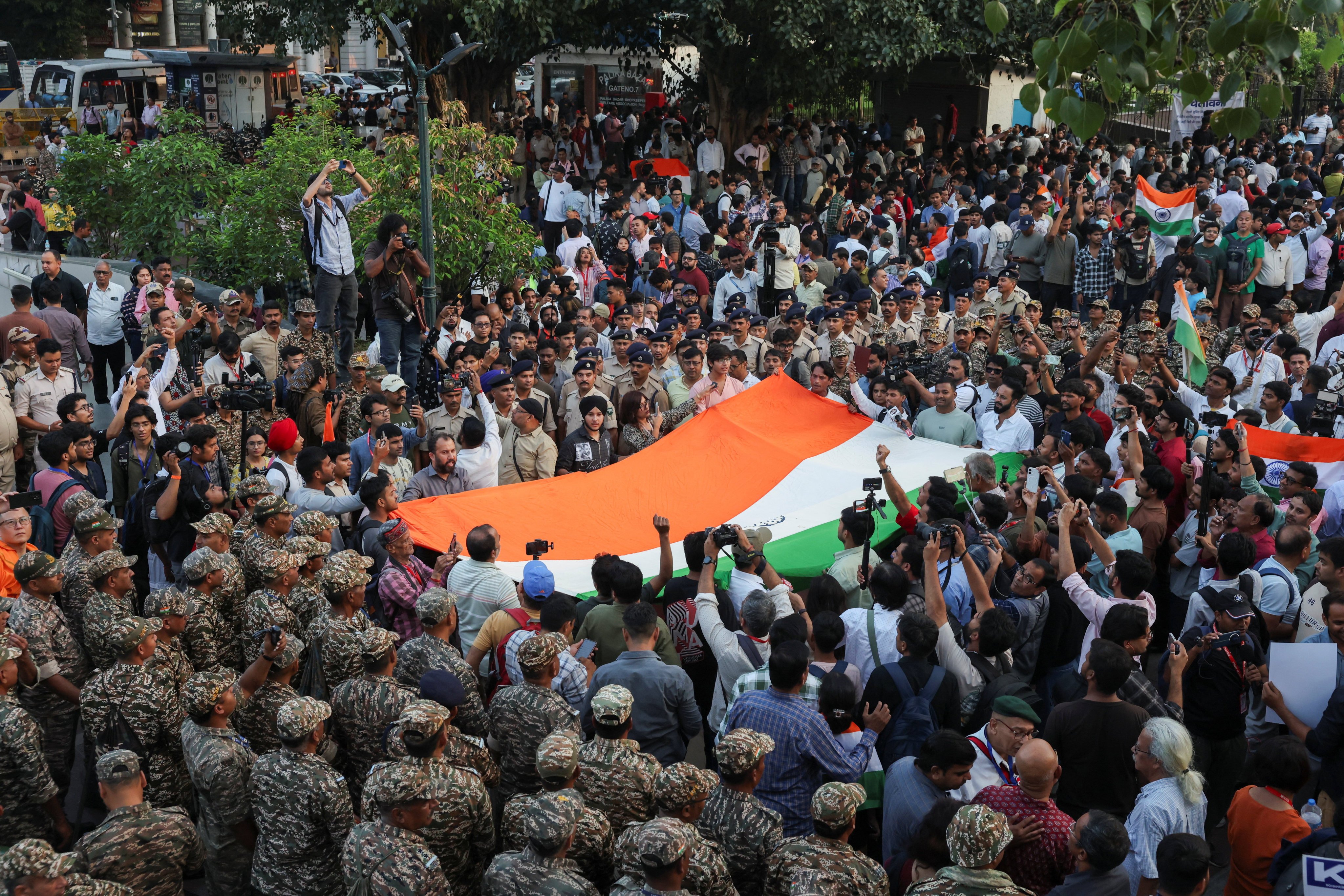 Cockroach Janta Party supporters protest amid heavy security in New Delhi, India, on Friday. Photo: Reuters