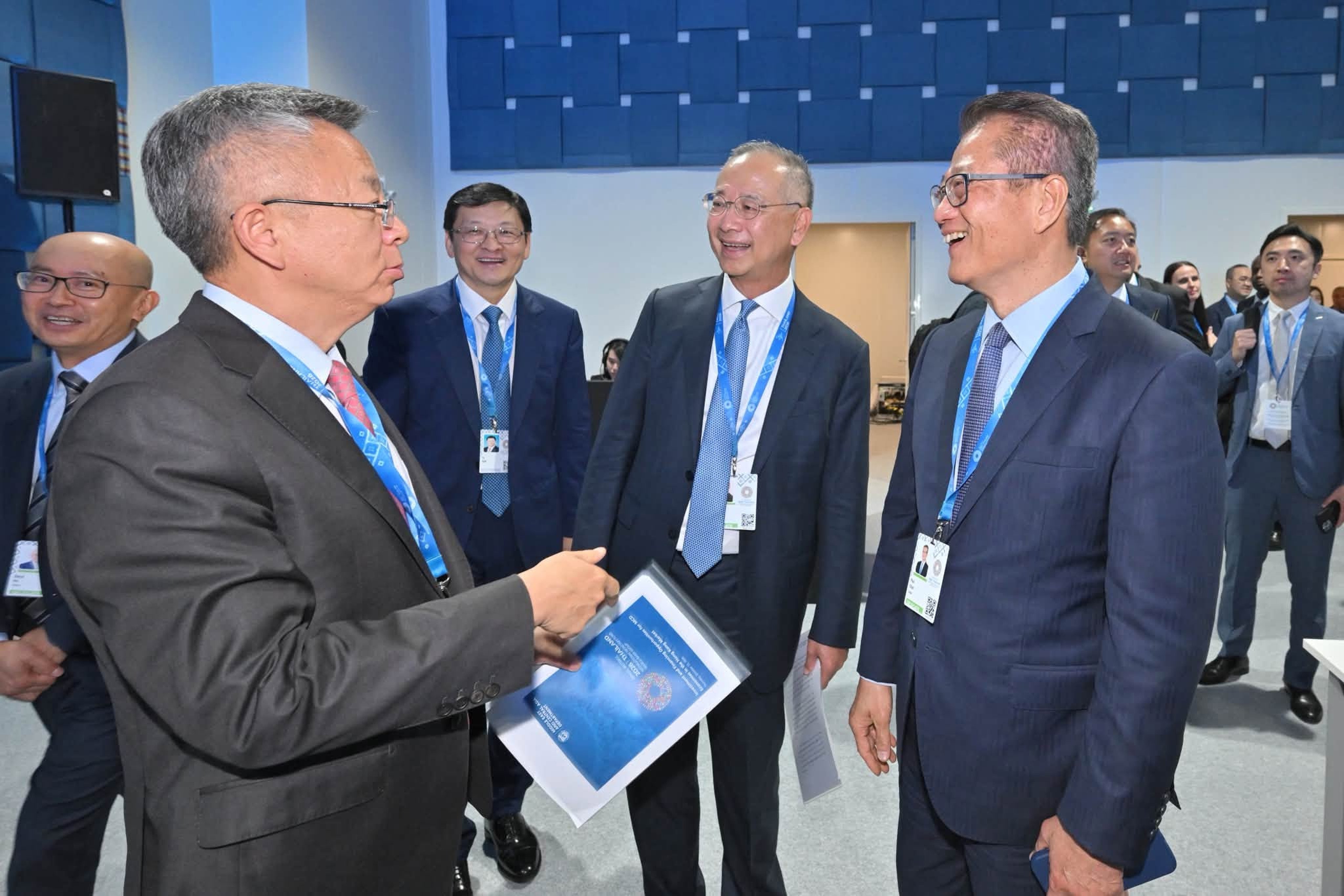 Finance chief Paul Chan (first from right) and chief executive of the Hong Kong Monetary Authority Eddie Yue (second from right) at the IMF and World Bank Group’s annual meetings in Bangkok. Photo: Handout