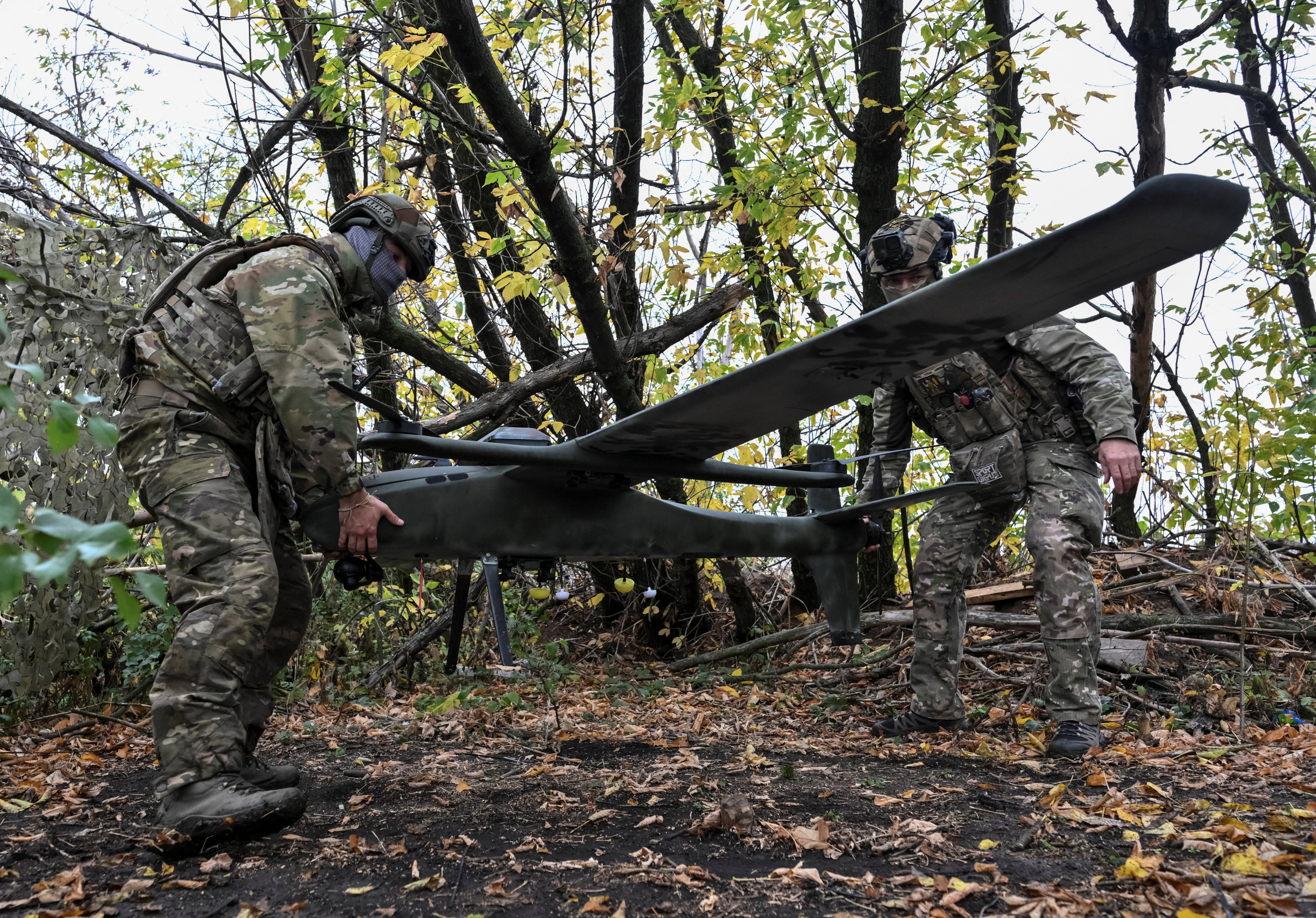 Servicemen of Ukraine’s National Police prepare a reconnaissance and strike drone at a position near a front line, amid Russia’s attack on Ukraine, in Donetsk region, Ukraine, on Friday. Photo: Reuters