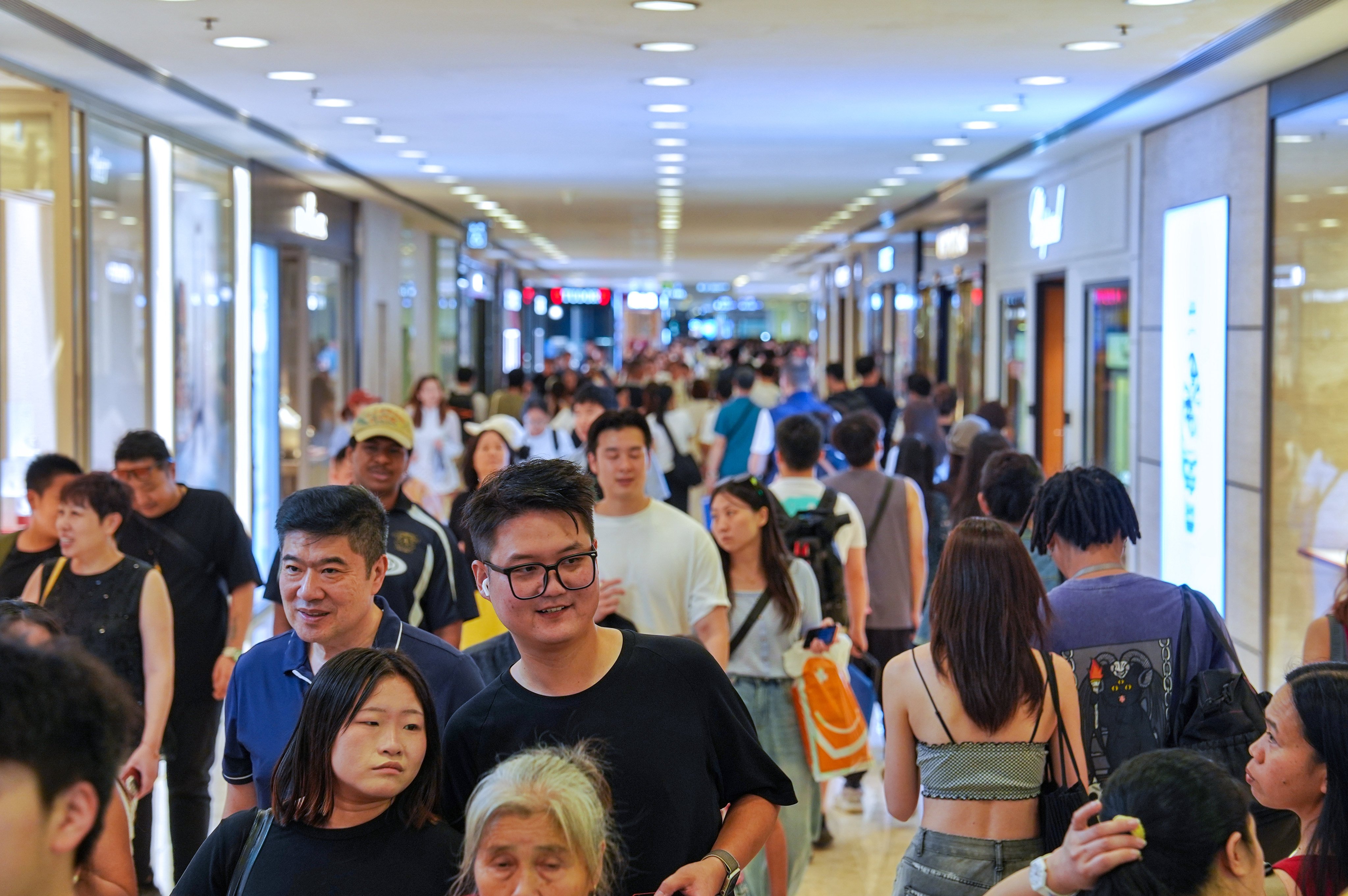 Authorities are in discussions with high-traffic private shopping centres to integrate CCTV systems, according to Chris Tang. Photo: Elson Li