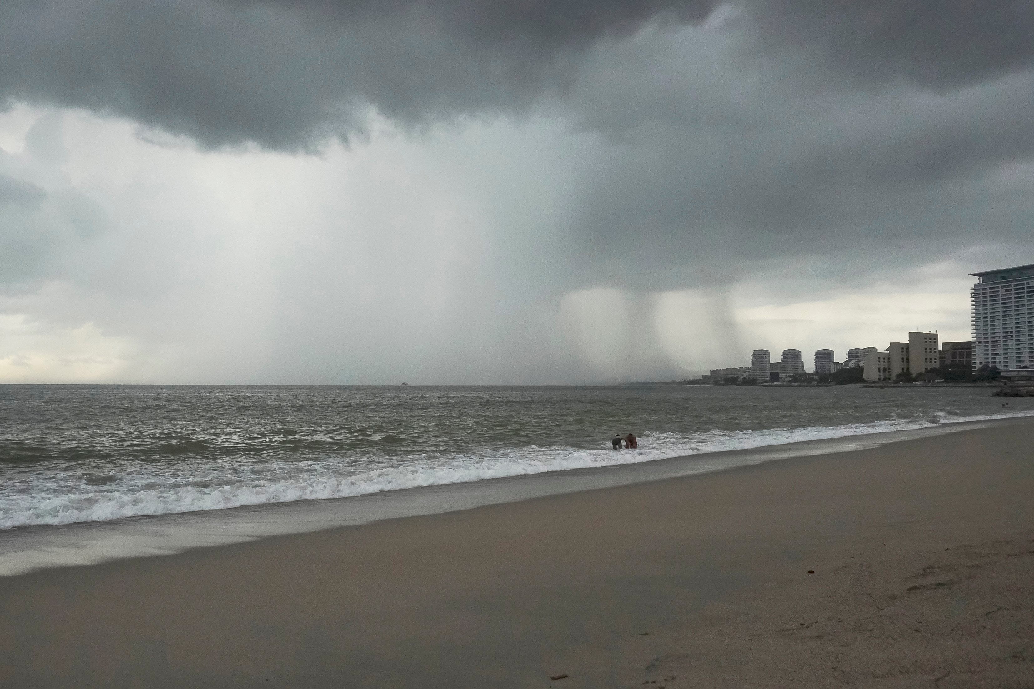 Rain associated with Hurricane Trudy falls in Puerto Vallarta, Mexico, on Friday. Photo: EPA