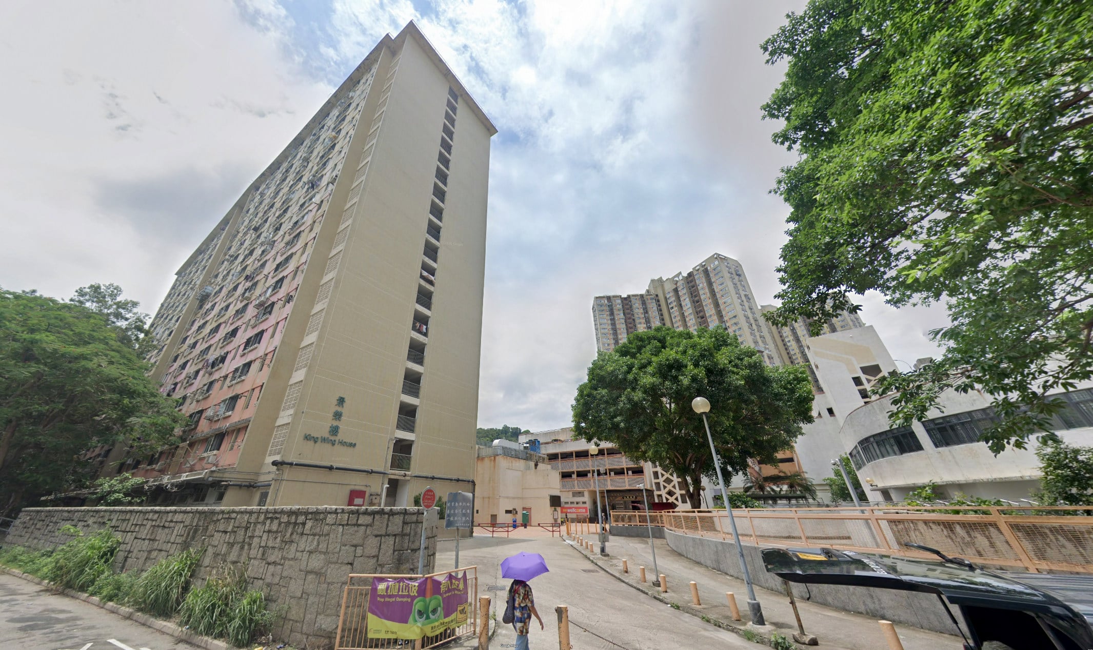 The man and woman were found unconscious inside a flat at King Wing House in Tuen Mun. Photo: Google Maps