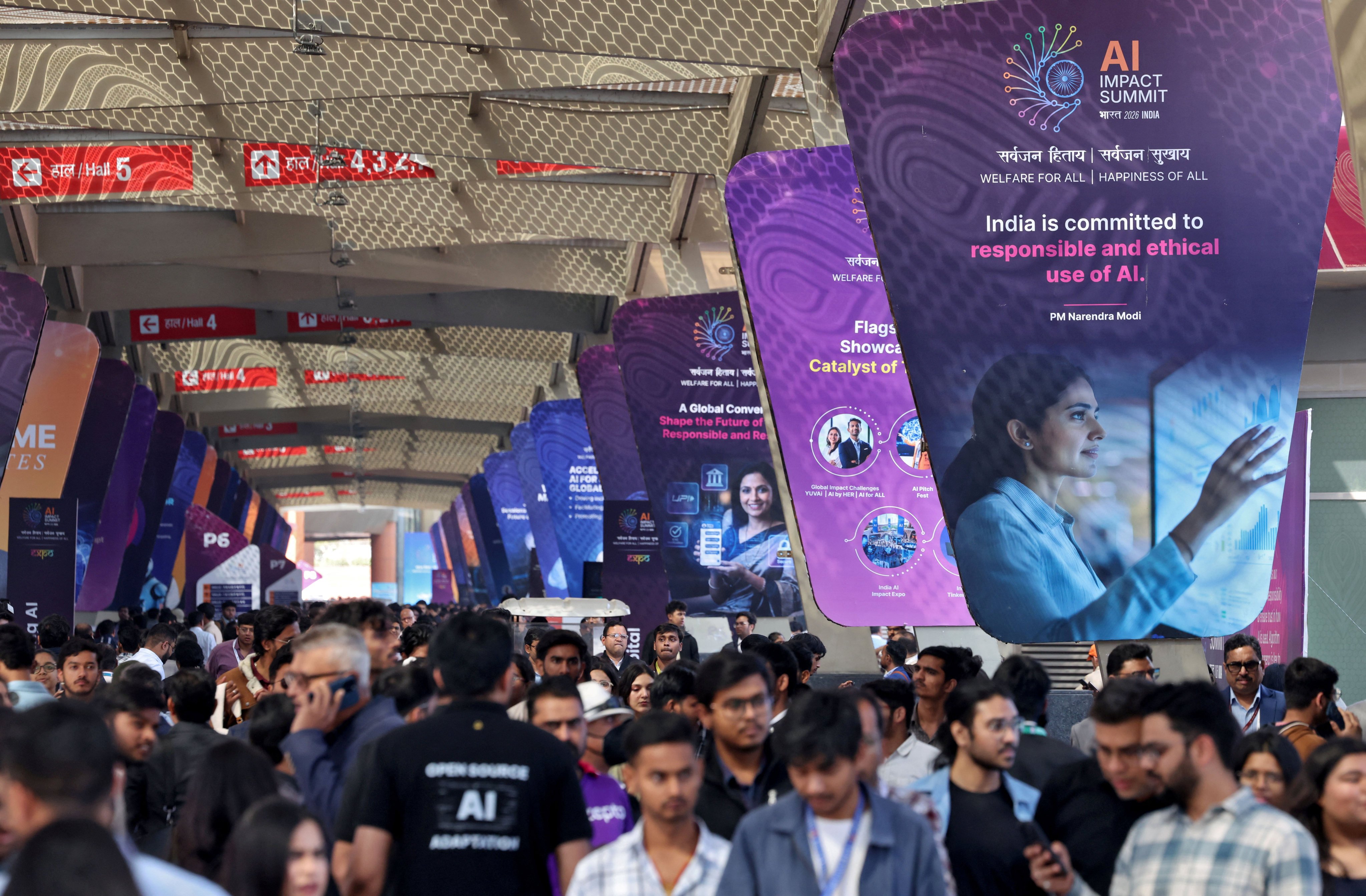 Visitors arrive at one of the venues for the AI Impact Summit in New Delhi in February. Photo: Reuters