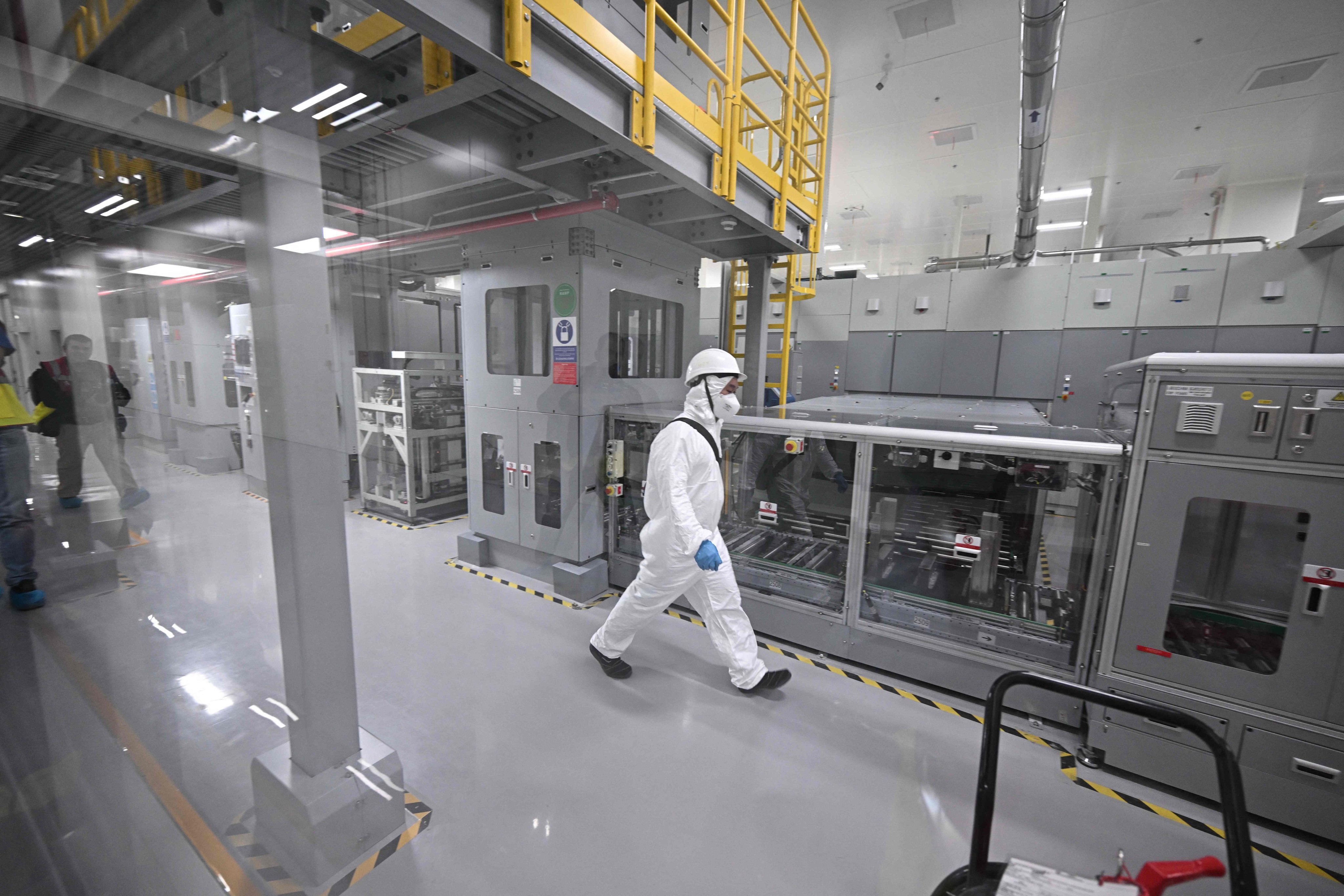 A worker walks through CATL’s battery cell plant in Debrecen, Hungary. Photo: AFP