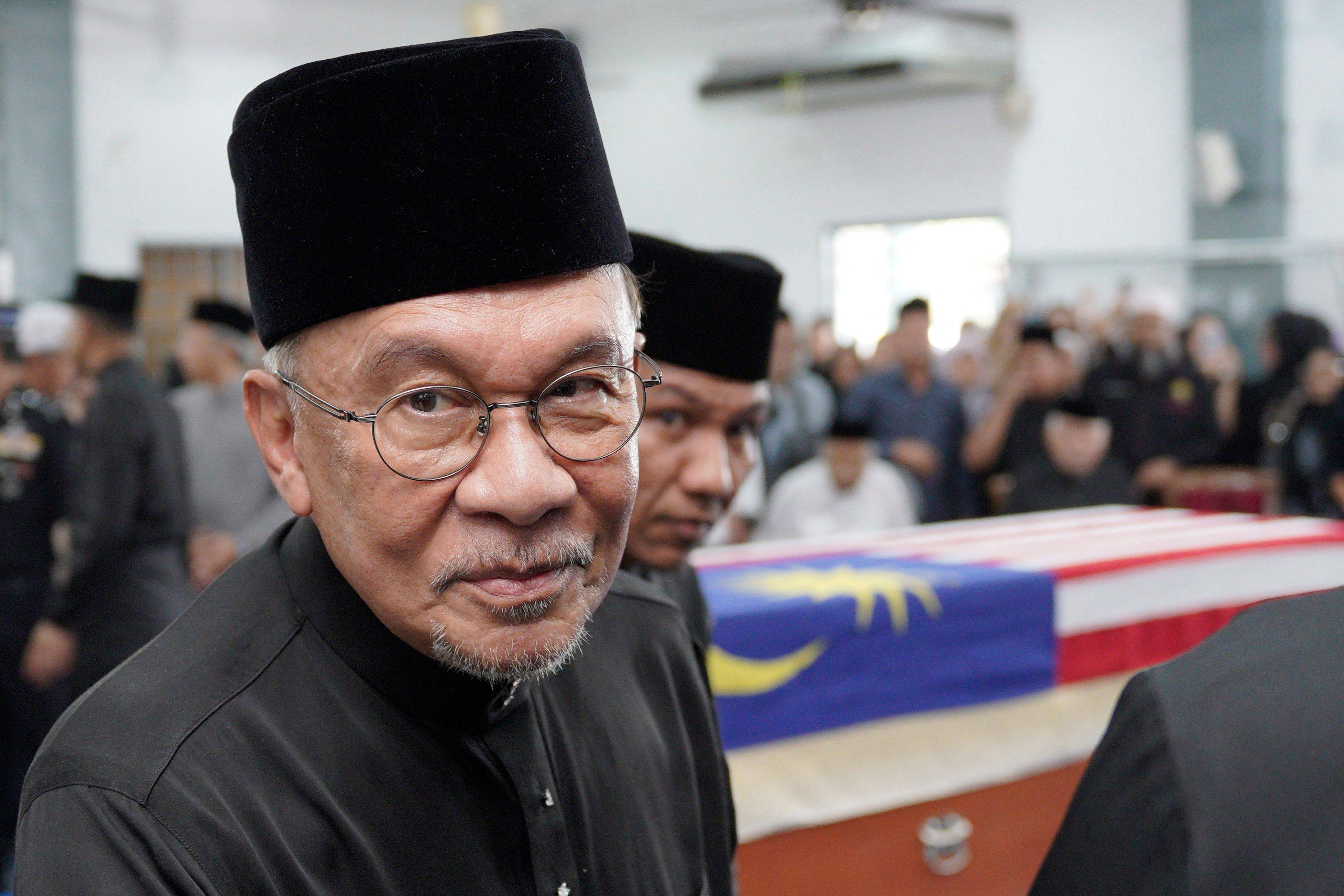 Malaysian Prime Minister Anwar Ibrahim attends the funeral of Siti Hasmah Mohamad Ali, wife of former Malaysian PM Mahathir Mohamad, in Kuala Lumpur in September. Photo: AFP