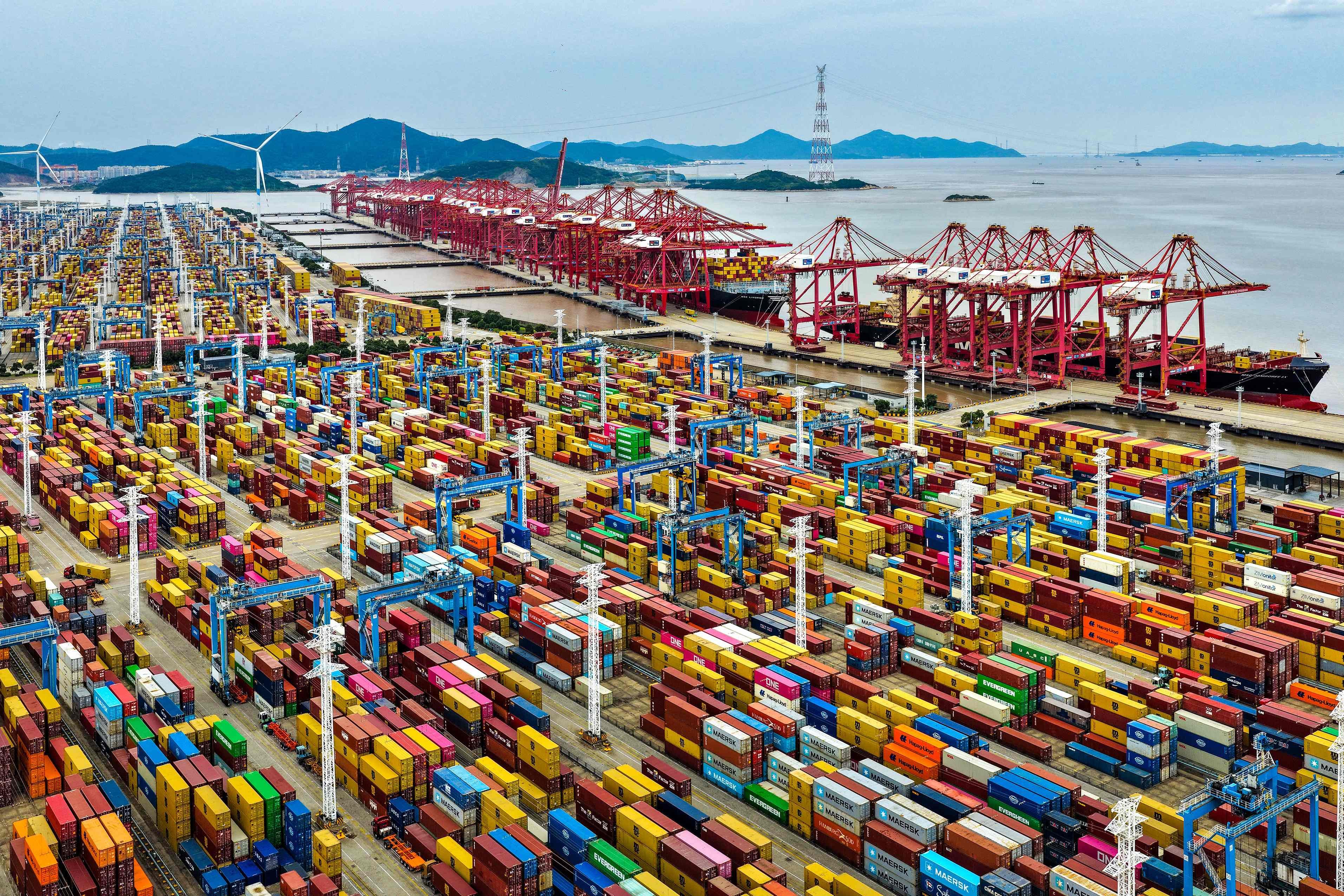Containers are loaded onto ships at the Ningbo-Zhoushan port in China’s eastern Zhejiang province. Photo: AFP