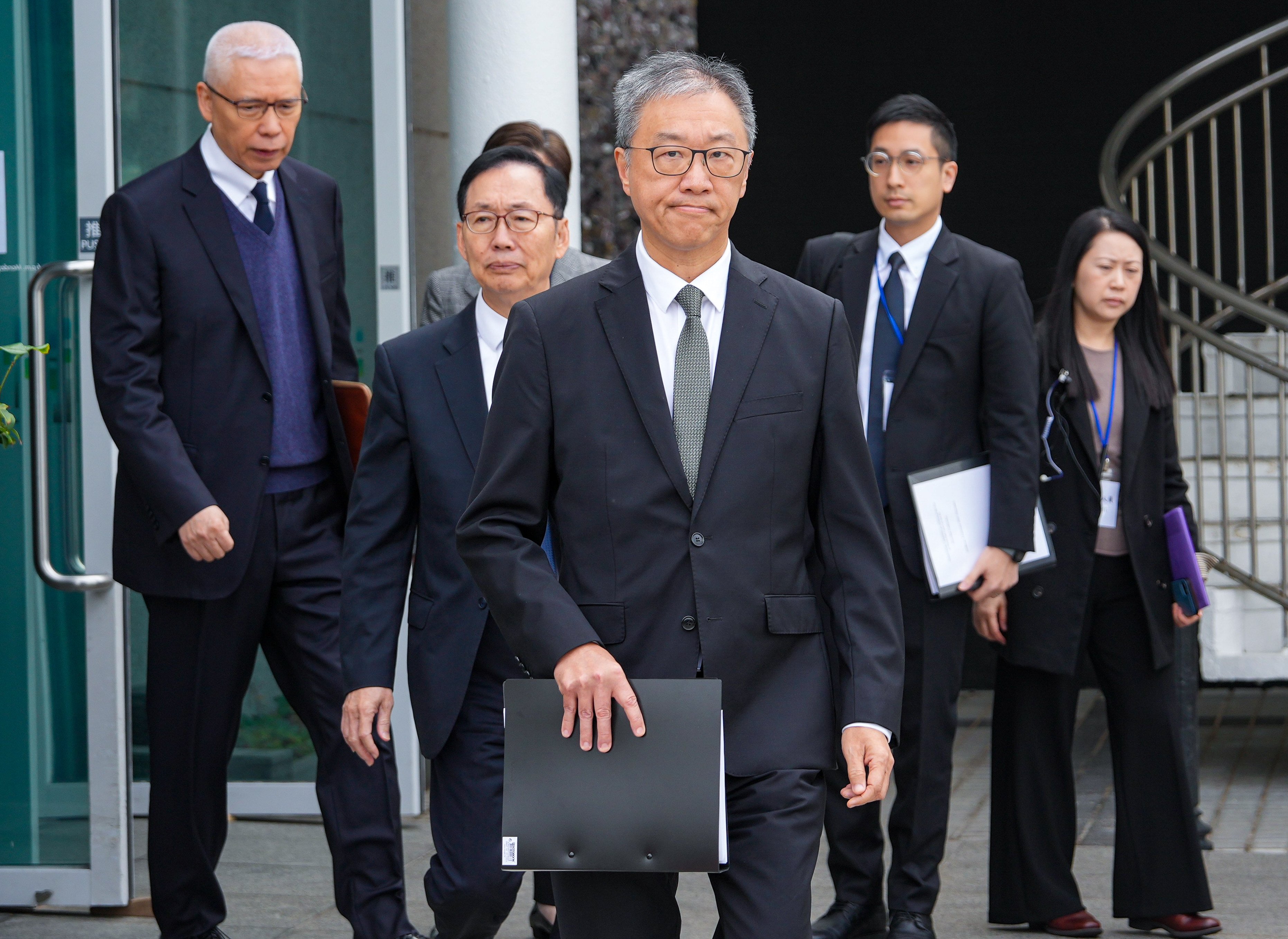 The independent panel comprised Justice David Lok (centre) and members Chan Kin-por (second left) and Rex Auyeung Pak-kuen (left). Photo: Sam Tsang