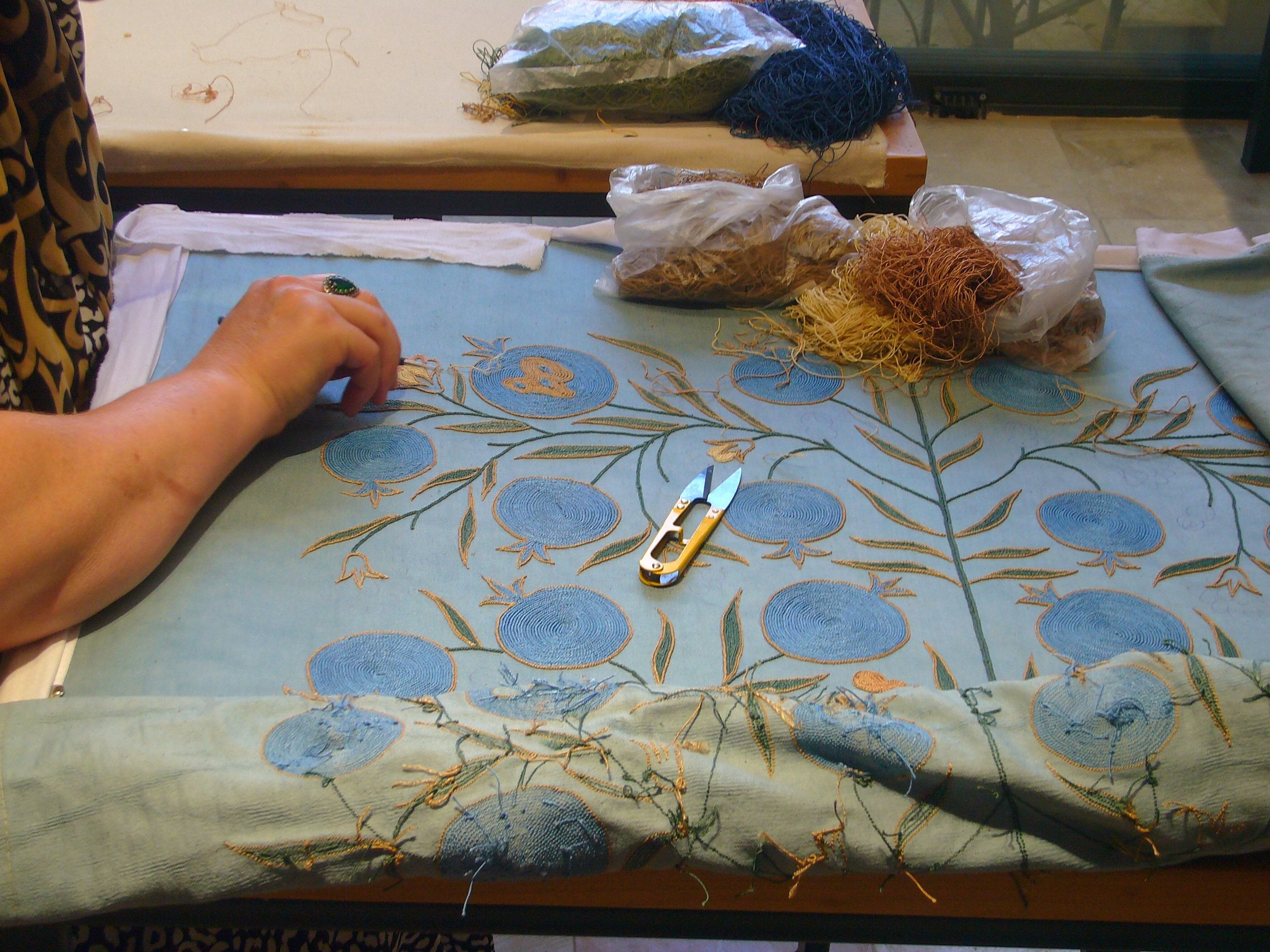 Women working at a suzani traditional Uzbek embroidery workshop in Tashkent. Photo: Charmaine Yu