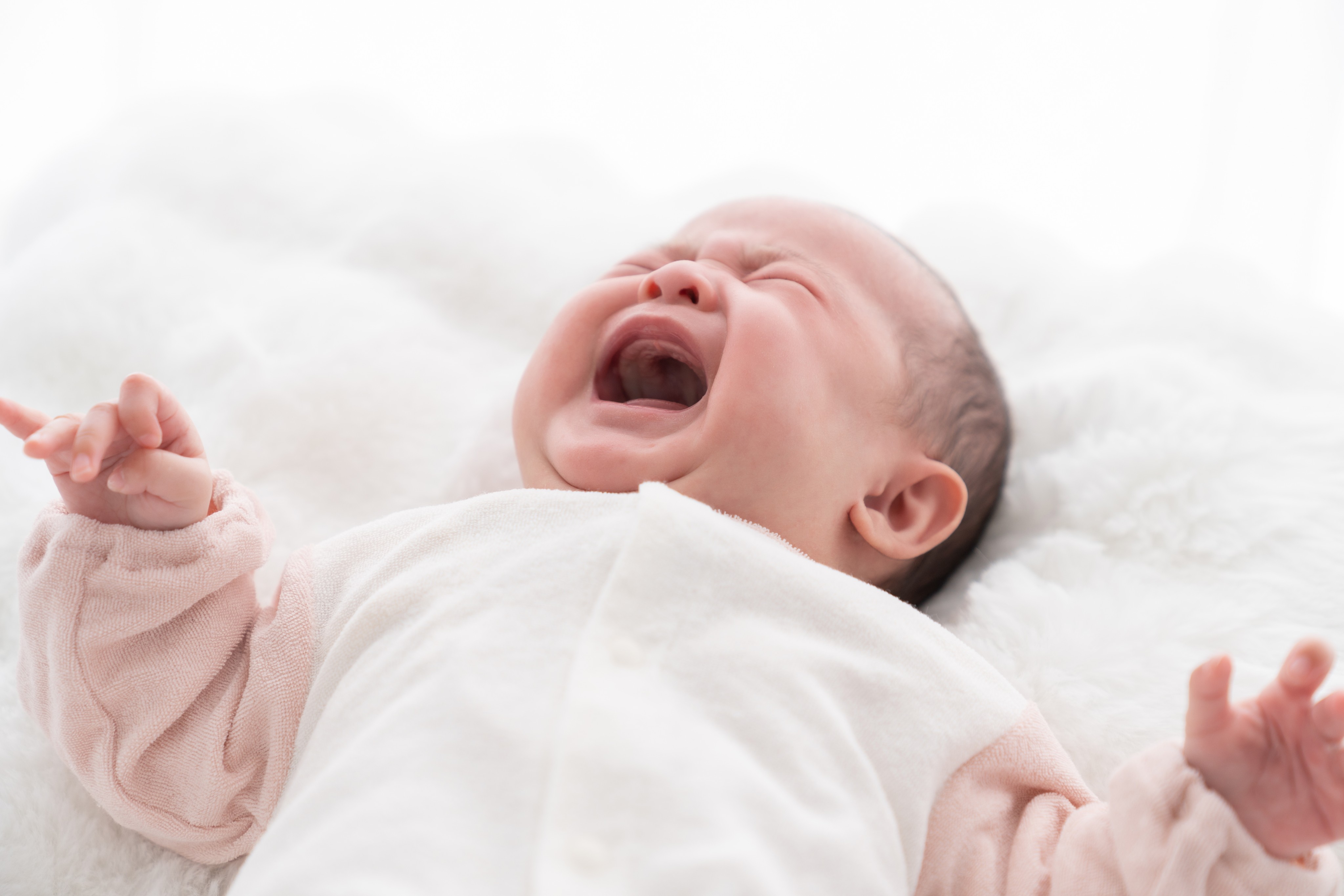 A crying Asian baby. Eight-month-old Trevor Neo was abused to stop him from crying. Photo: Shutterstock