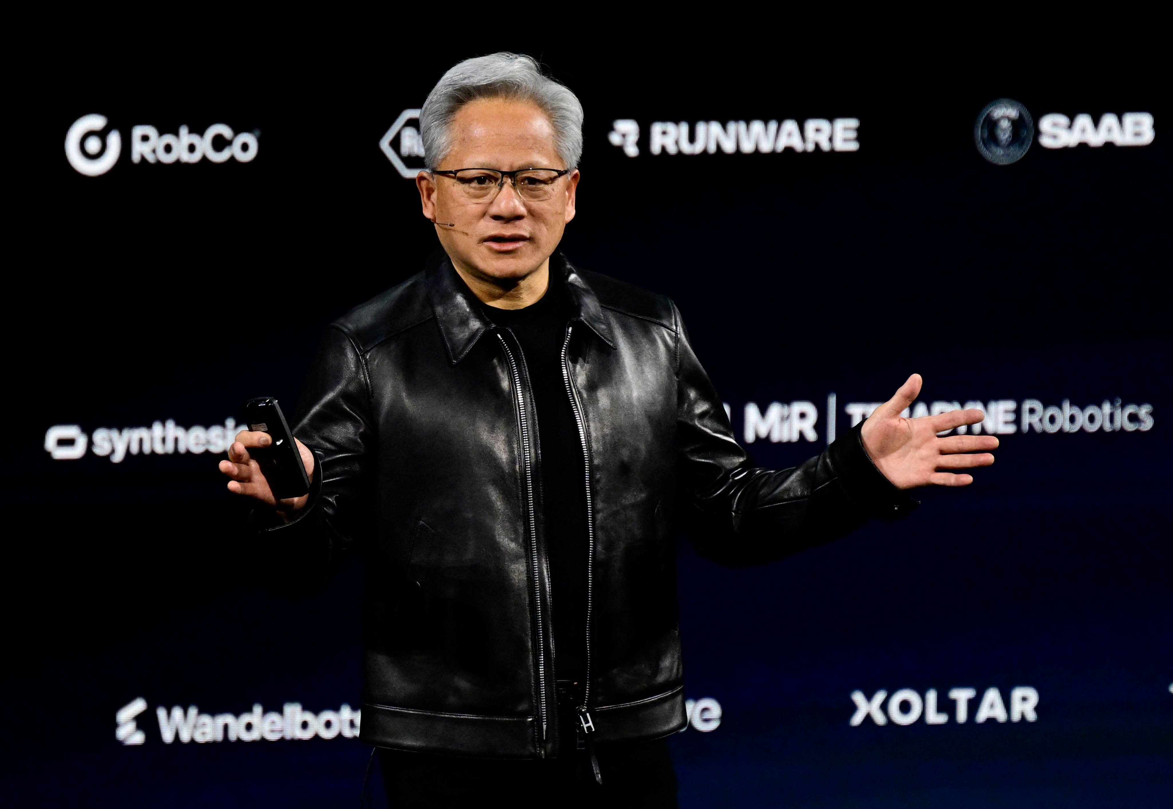 Nvidia CEO Jensen Huang delivers a keynote speech during the Nvidia GTC Berlin Artificial Intelligence conference on October 21. Photo: AFP