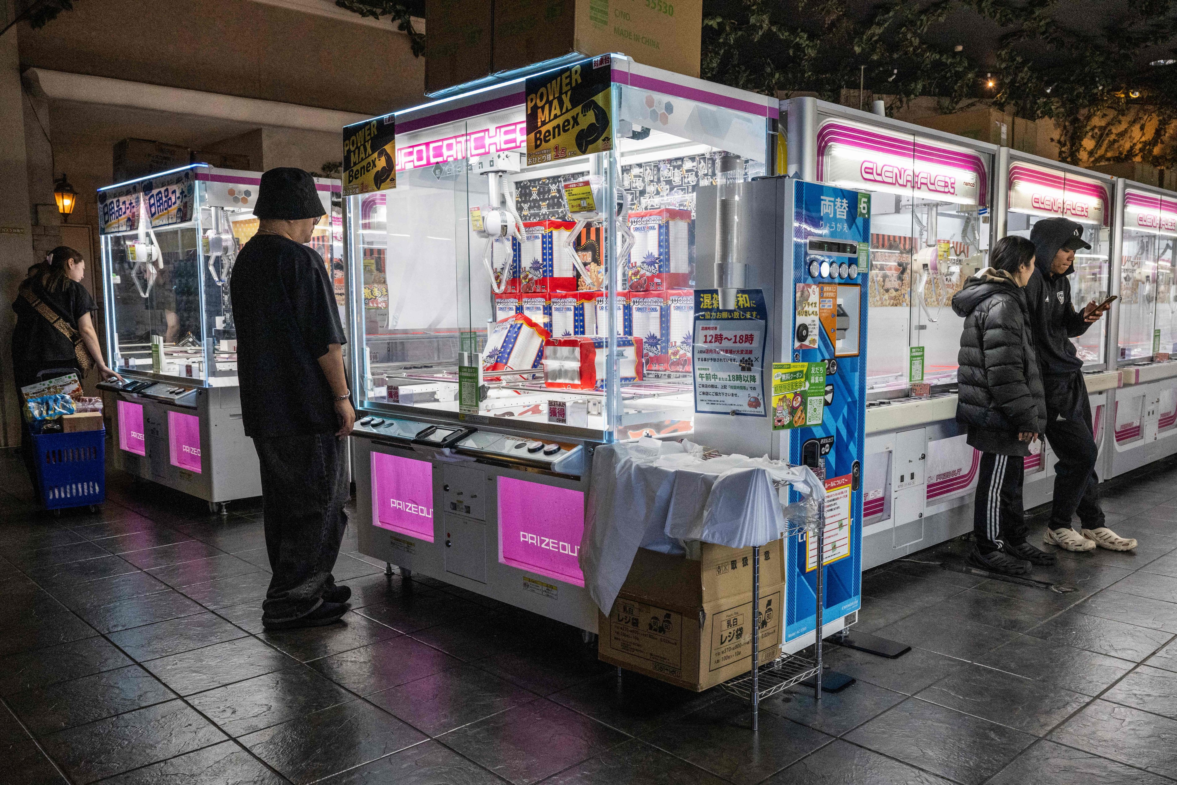 Inflation-squeezed Japanese flock to claw machines dangling everyday ...