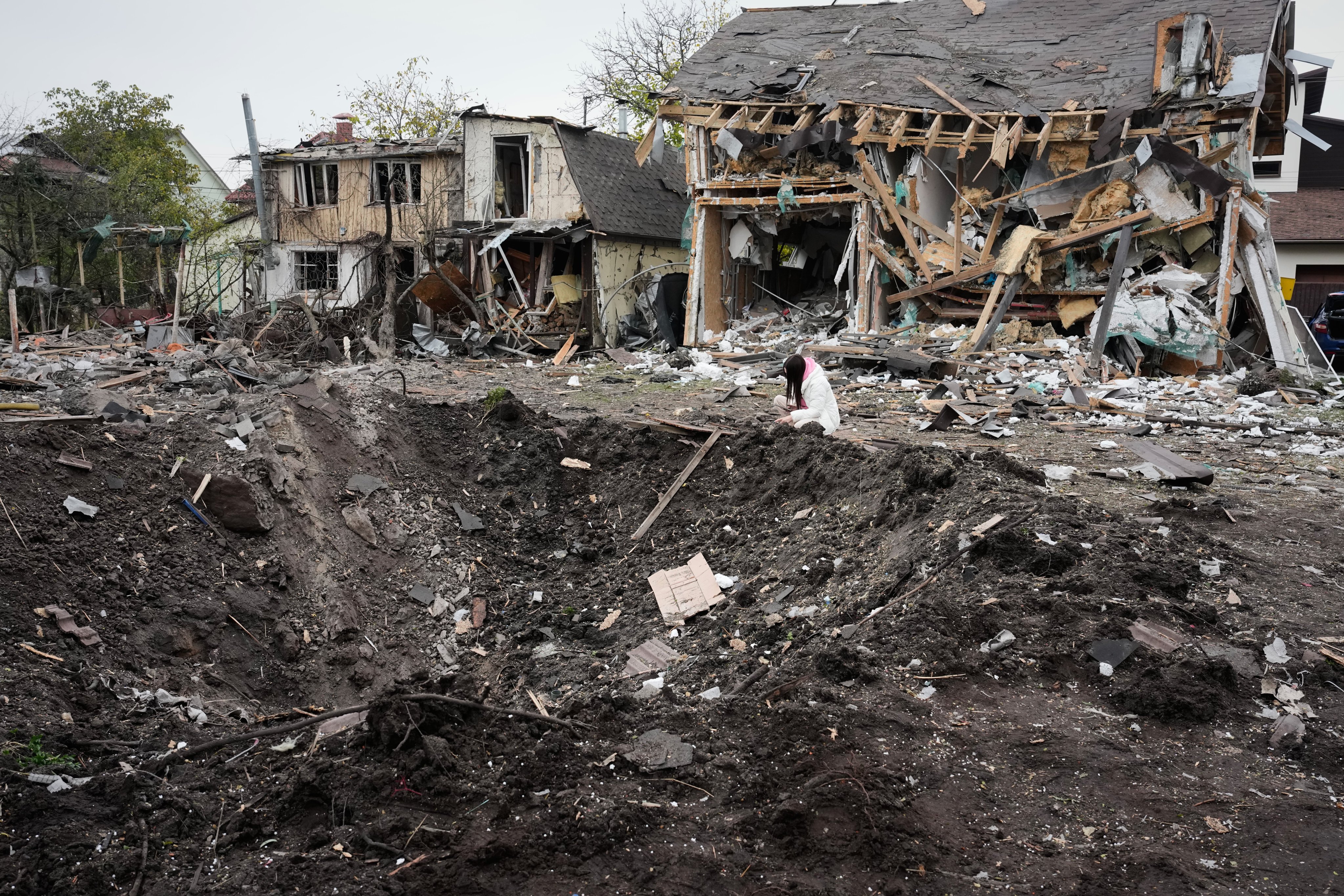 A crater caused by Russian missile strike in Kyiv. Photo: AP