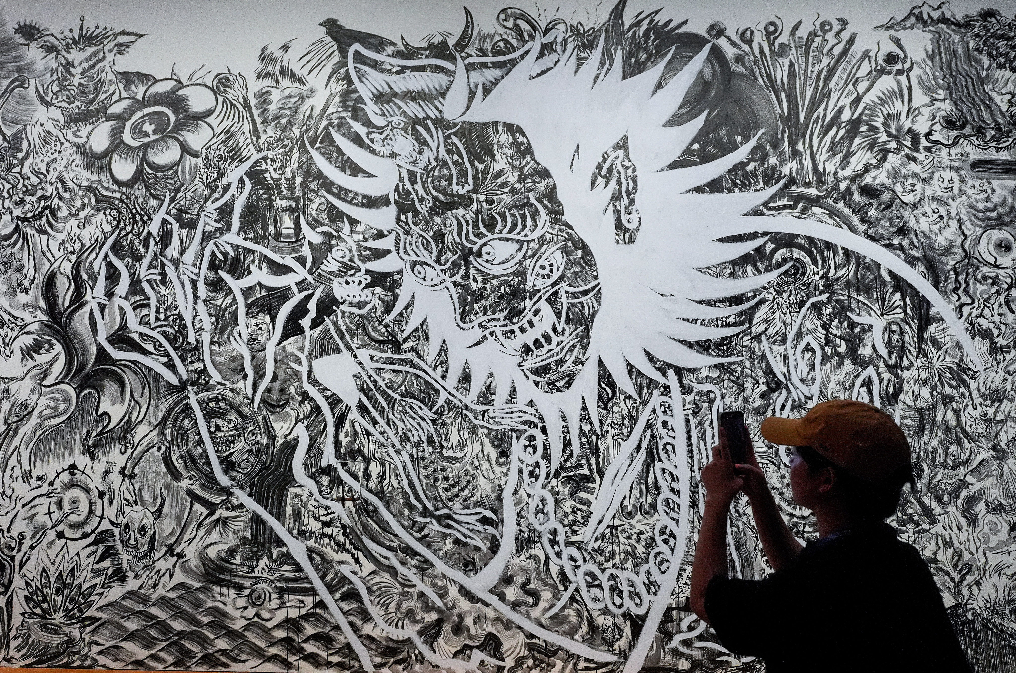 Fear Catcher (2026), a mural by Oscar Chan, at “Myths and Monsters: The Art of Fantasy in Asia”, at M+ in Hong Kong’s West Kowloon Cultural District. Photo: Elson Li