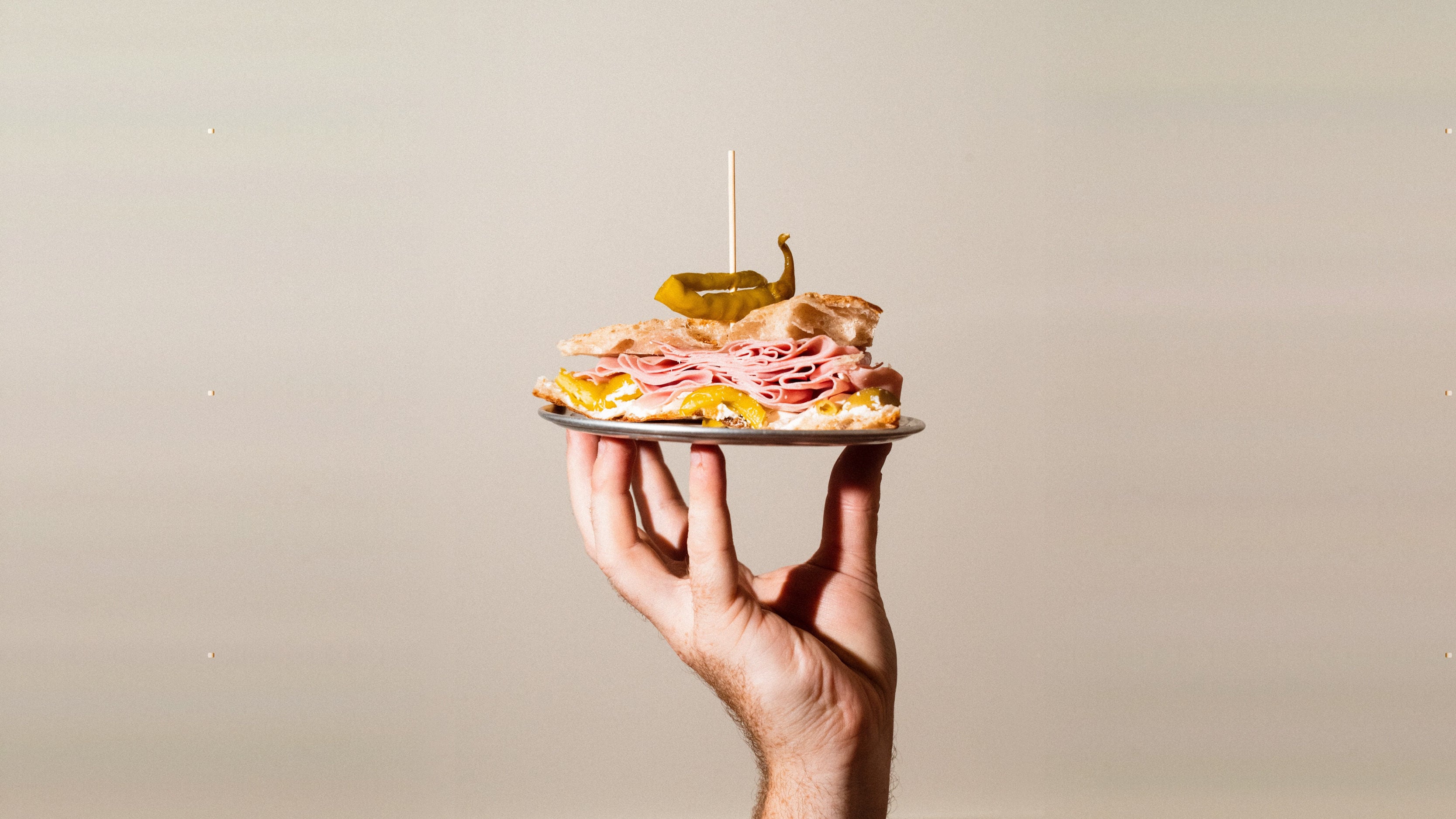 Arguably, one of Bar Leone’s most famous creations is not a cocktail but its mortadella sandwich. Photo: Handout