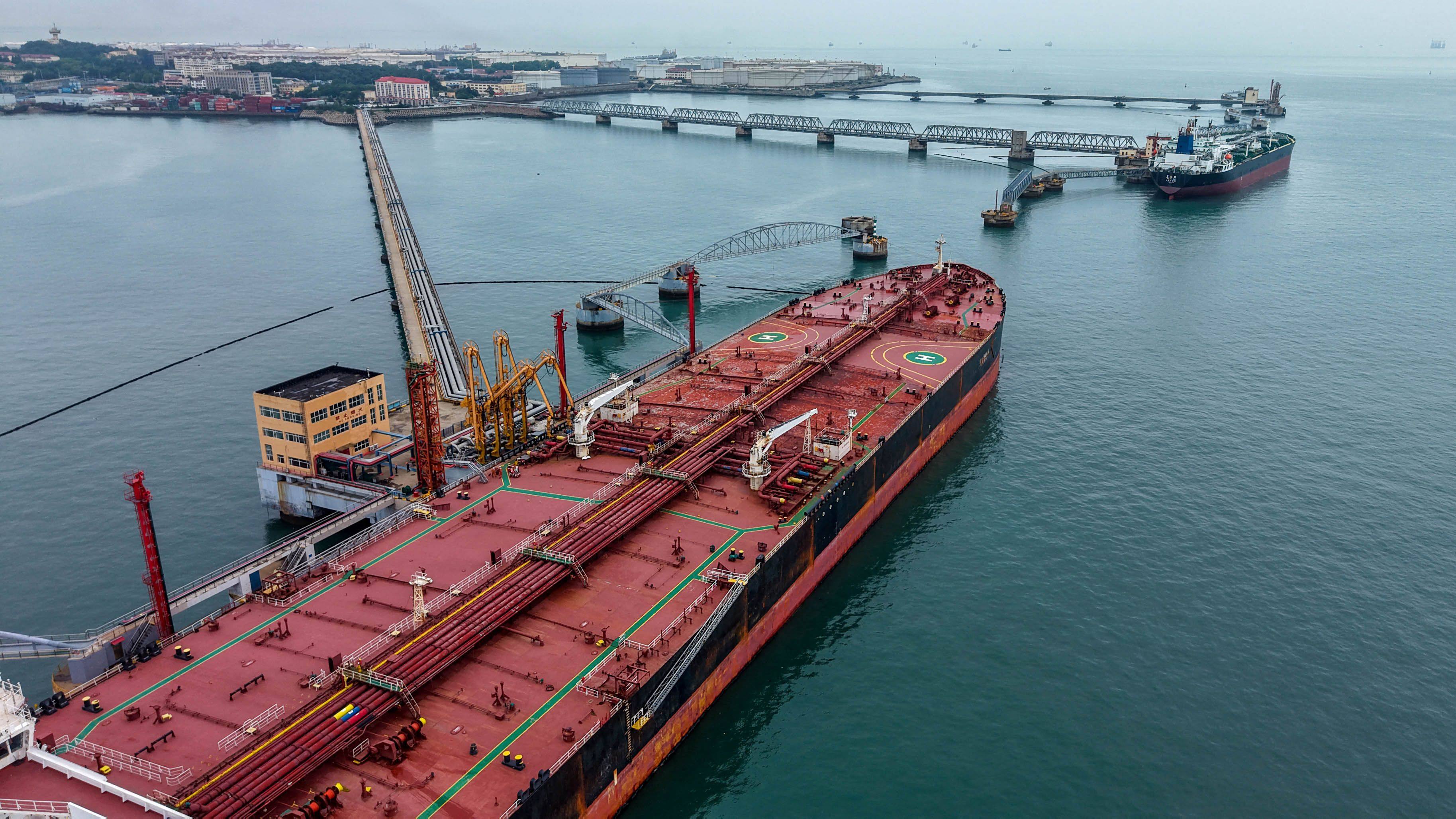 Oil tankers unload imported crude oil at Qingdao port, in China’s eastern Shandong province on July 16. Photo: AFP
