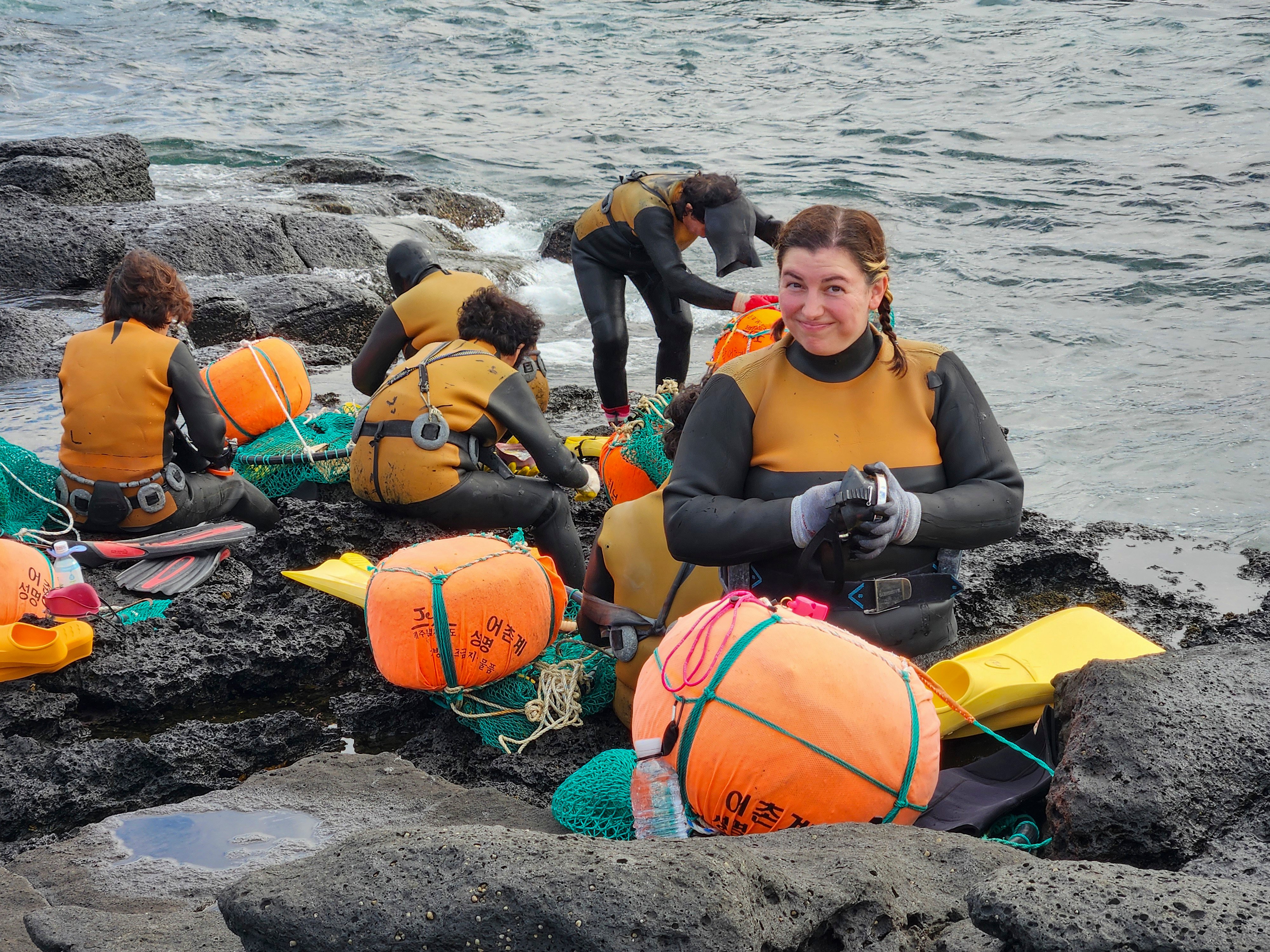 Kylie Genter, an American haenyeo, near the ocean in Youngrak village on Jeju Island. Photo: courtesy of Kylie Genter