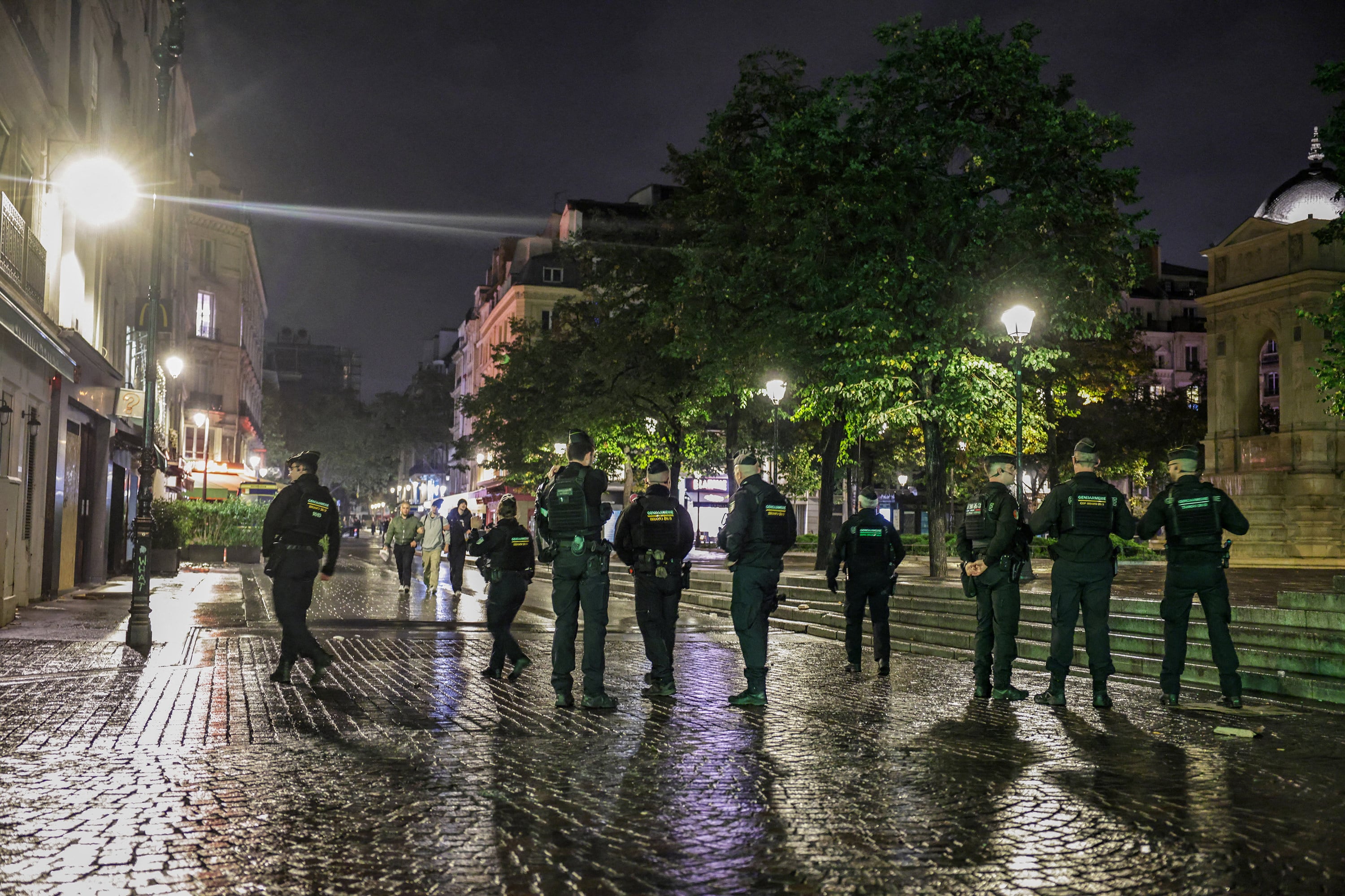 Police patrol around the Les Halles district in Paris, France, on Monday. Photo: Le Parisien/ABACA Press/TNS