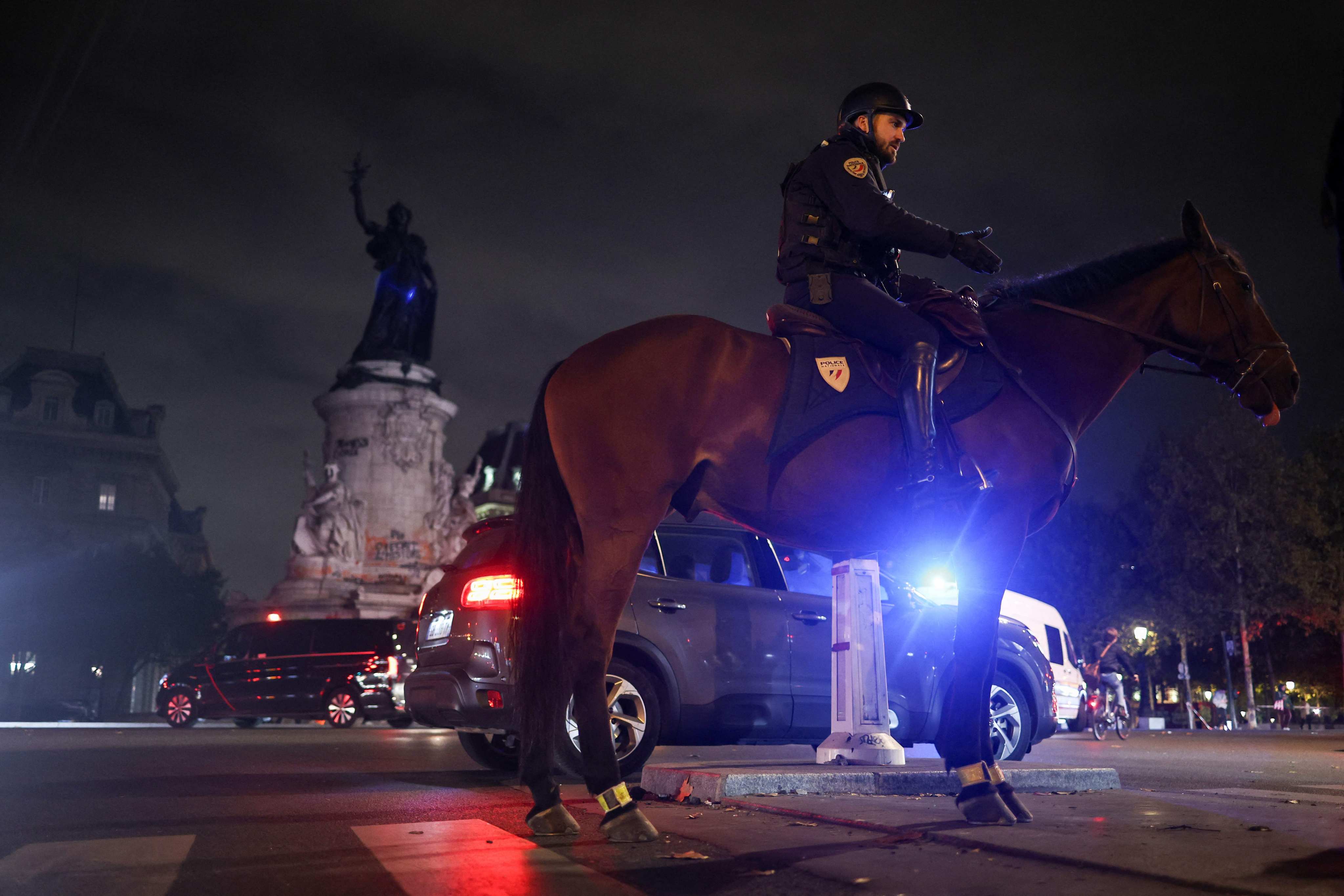 A mounted policeman patrols near Place de la Republique in Paris on Tuesday. Photo: AFP
