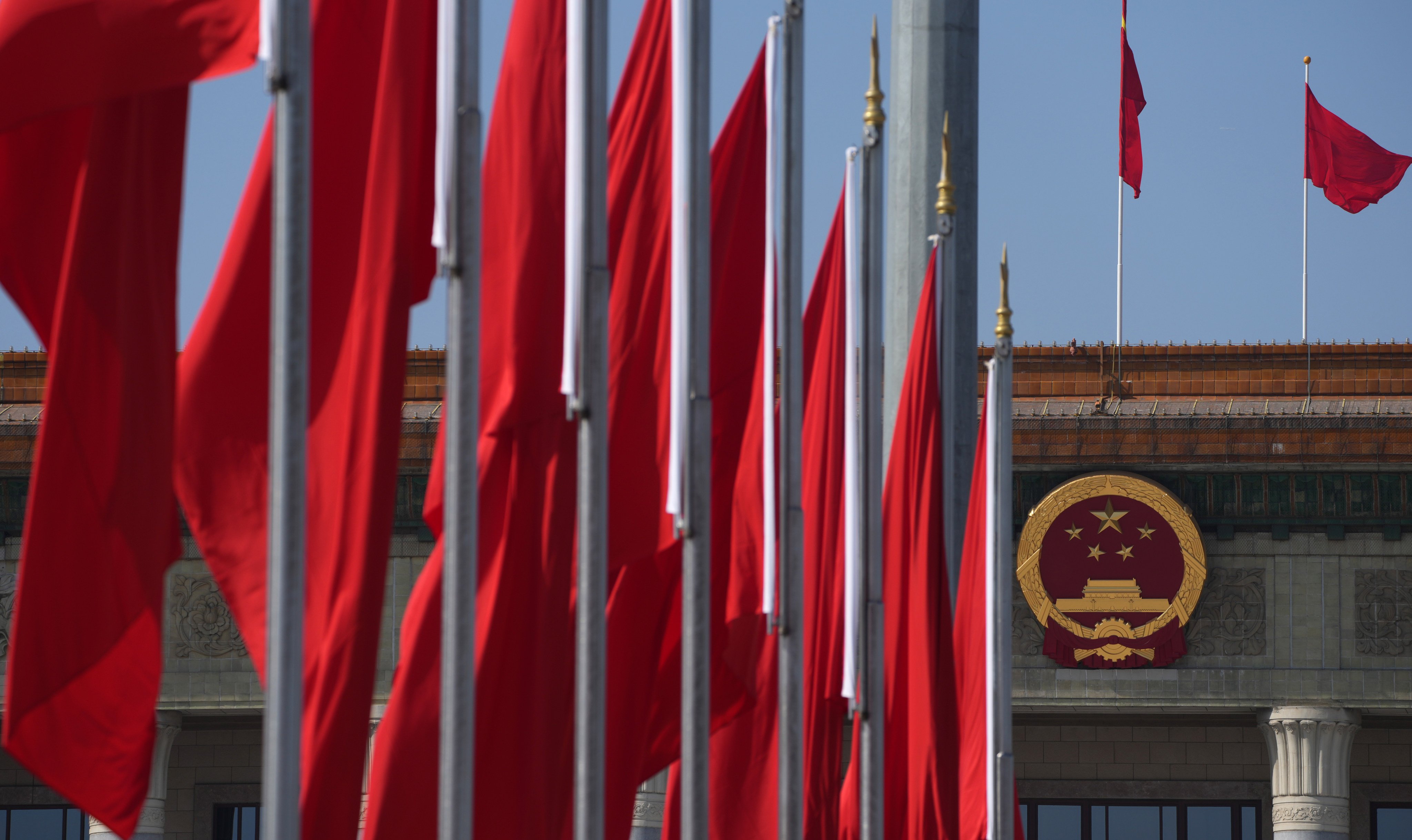 Flags flying in Beijing's Tiananmen Square. Photo: Robert Ng
