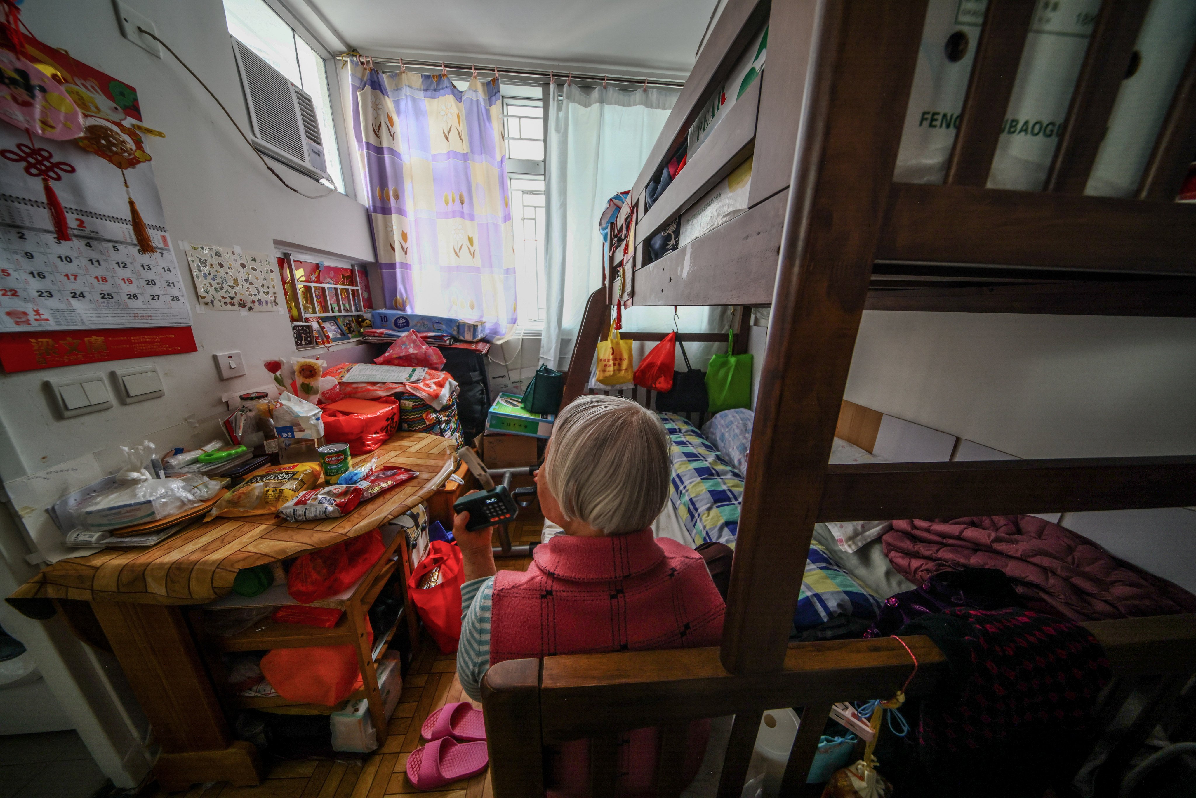 A socially isolated elderly resident of Hoi Ying Estate in Hong Kong on February 7. Photo: Dickson Lee