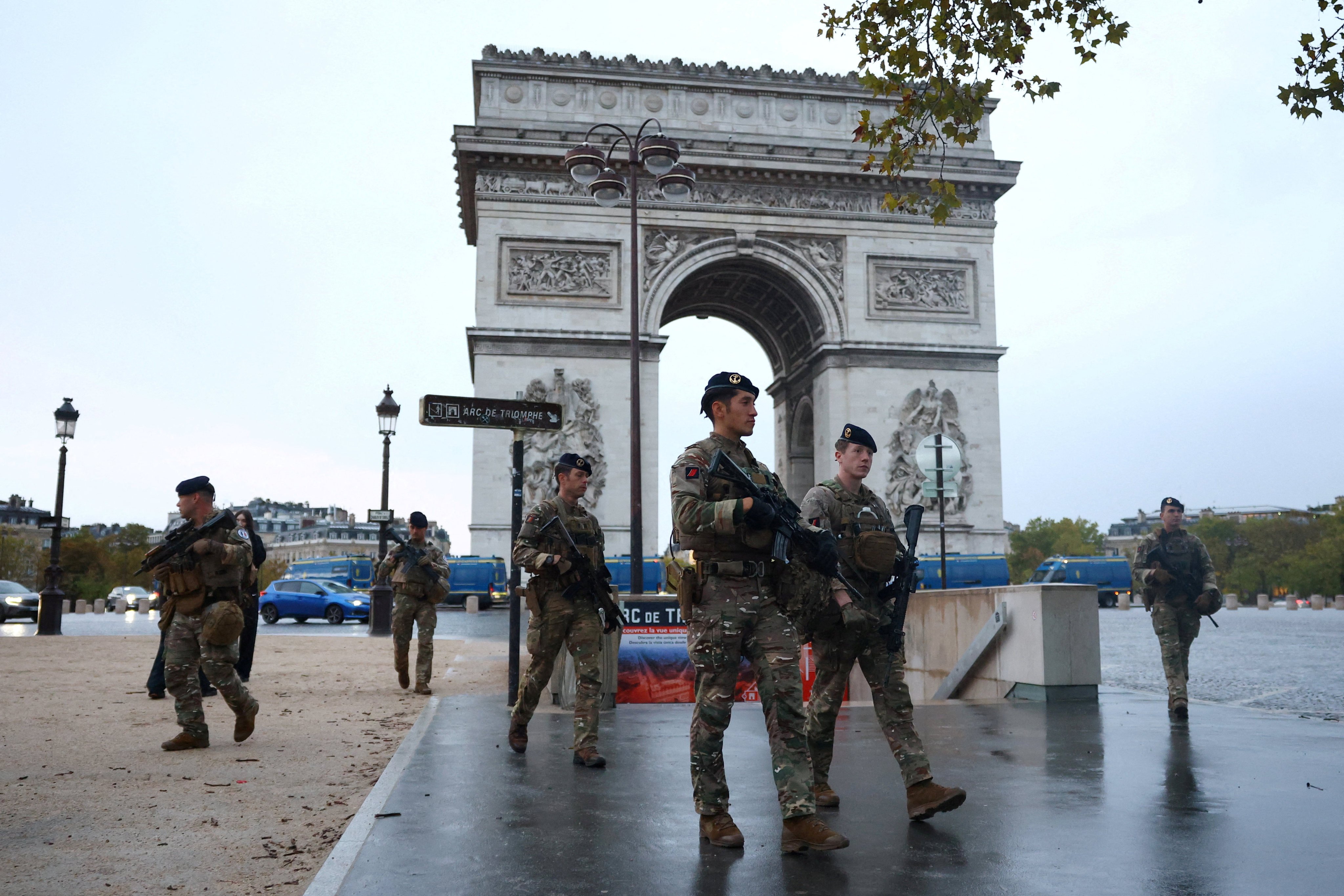 French soldiers patrol near the Arc de Triomphe and the Champs-Elysees avenue in Paris ahead of nationwide protests  Saturday. Photo: Reuters