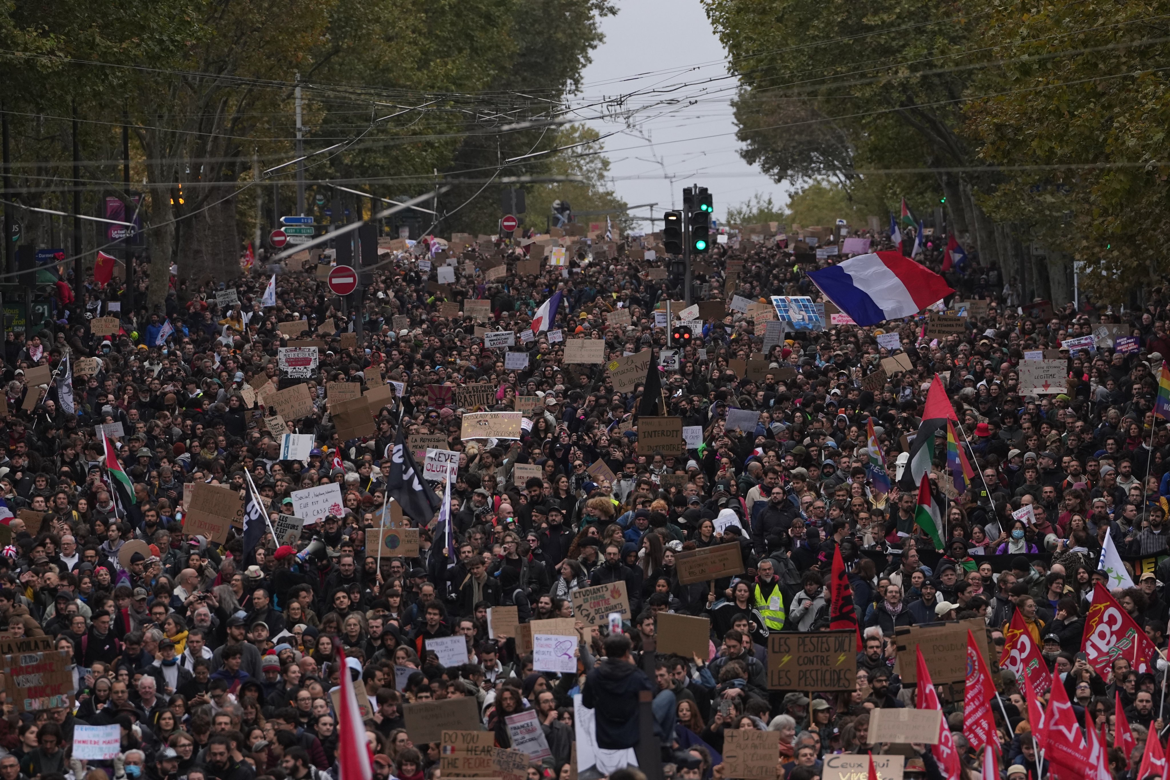 Protesters march against rising living costs in Paris on Saturday. Photo: AP