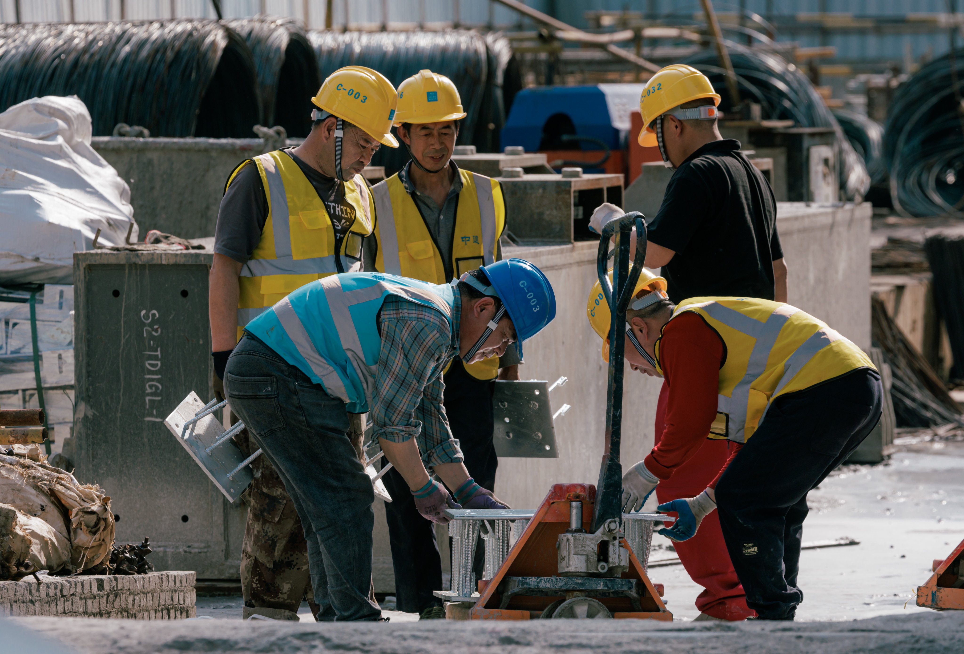 Labourers at a construction site in Shanghai, China, on April 15, 2024. Photo: EPA-EFE