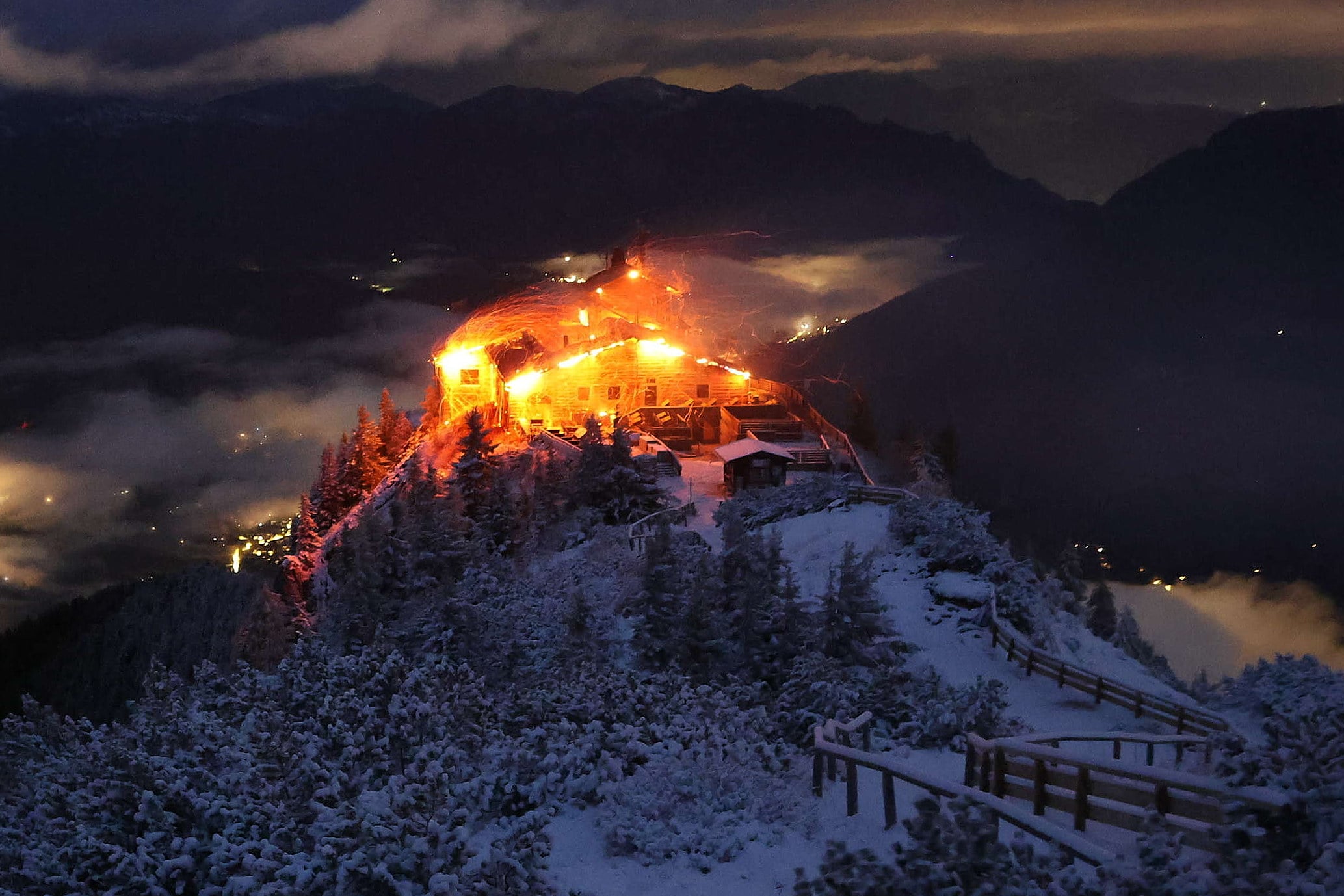 The building known as the Eagle’s Nest built is seen on fire in the Bavarian Alps on Saturday. Photo: Bergerlebnis Berchtesgaden via AP