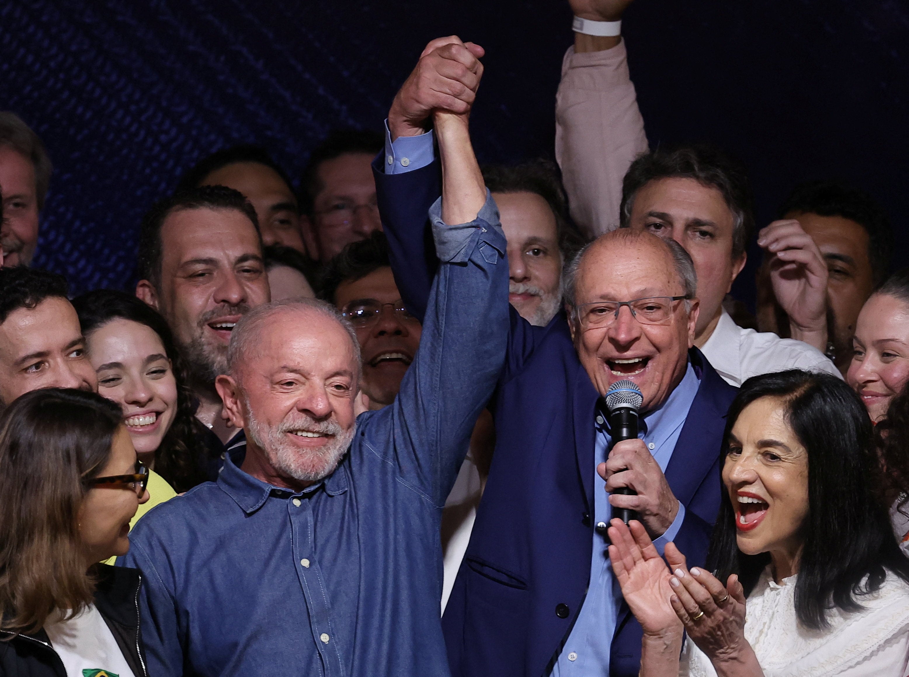 Brazil’s President Luiz Inacio Lula da Silva, the Workers’ Party candidate for re-election, joins hands with Vice President Geraldo Alckmin while gathering with supporters after winning the presidential runoff in Sao Paulo, Brazil, on Sunday. Photo: Reuters