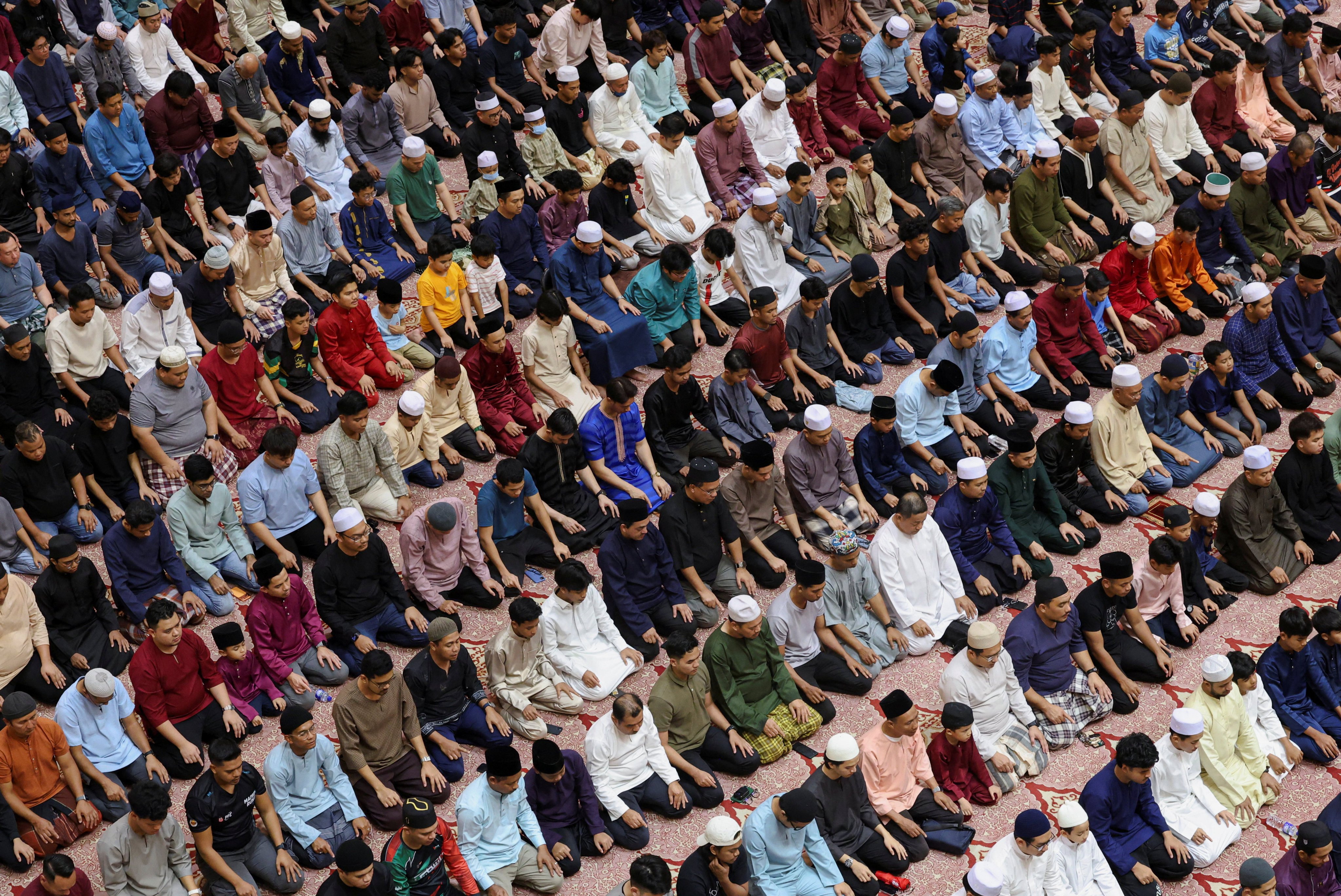 Muslims pray during the holy fasting month of Ramadan at Putra Mosque in Putrajaya in February. Photo: Reuters