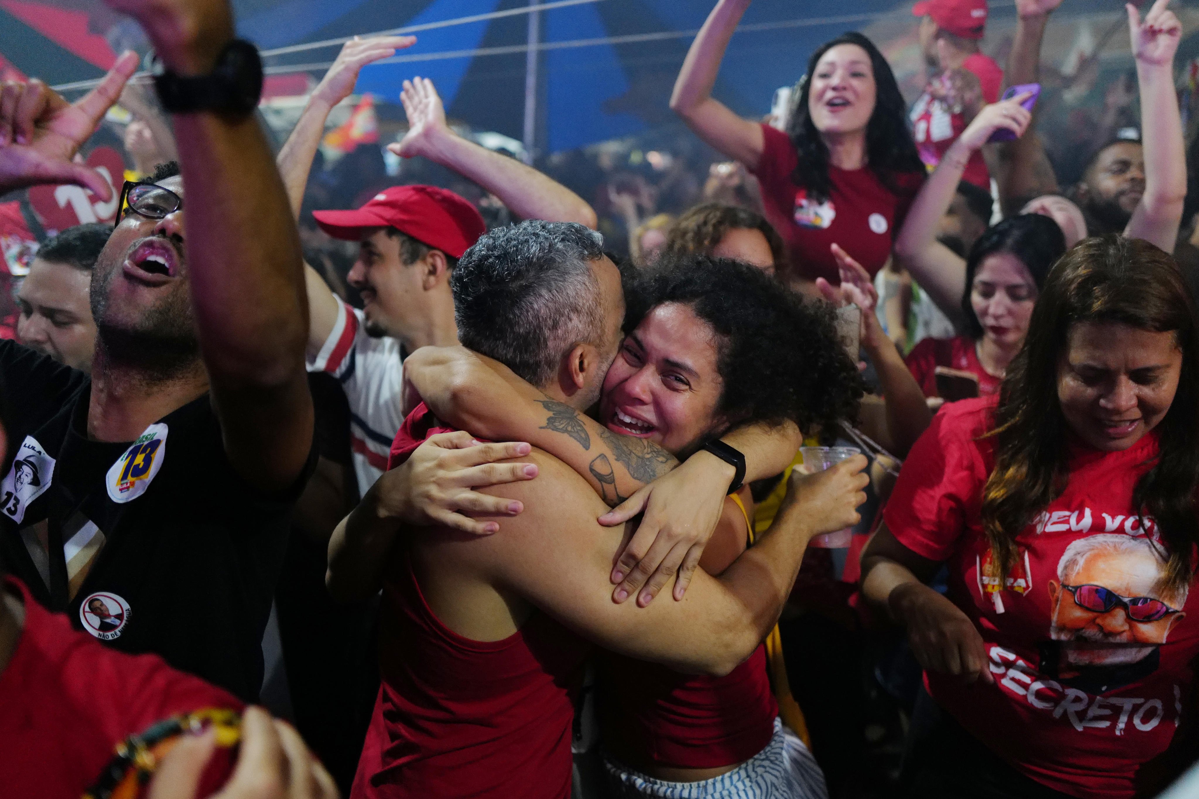 Supporters of President Luiz Inacio Lula da Silva celebrate after he won. Photo: AP