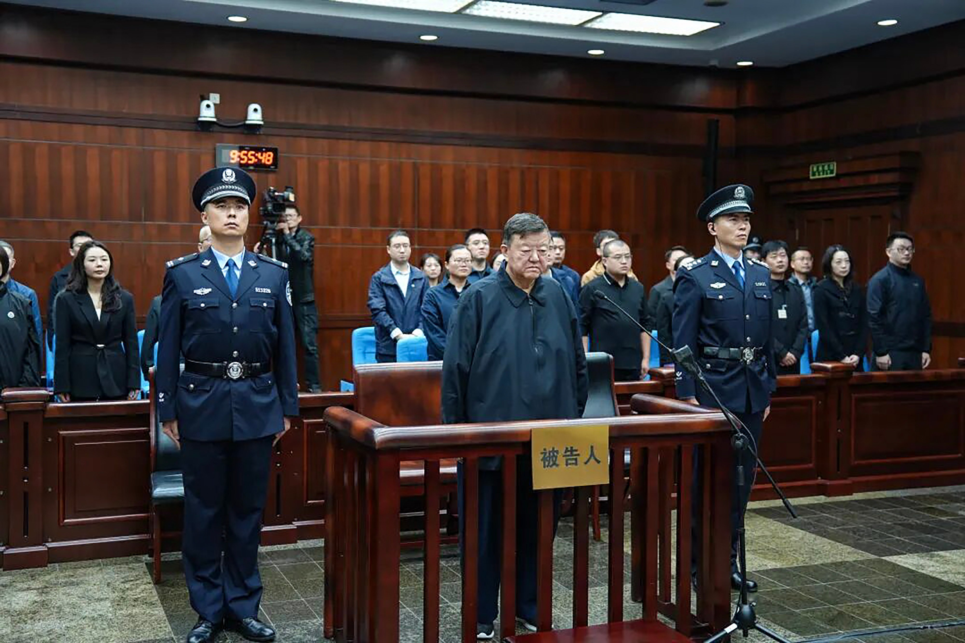 Wang Huimin, a former official at the China Securities Regulatory Commission, is sentenced at a court in Chengdu, China’s southwestern Sichuan province. Photo: CCTV