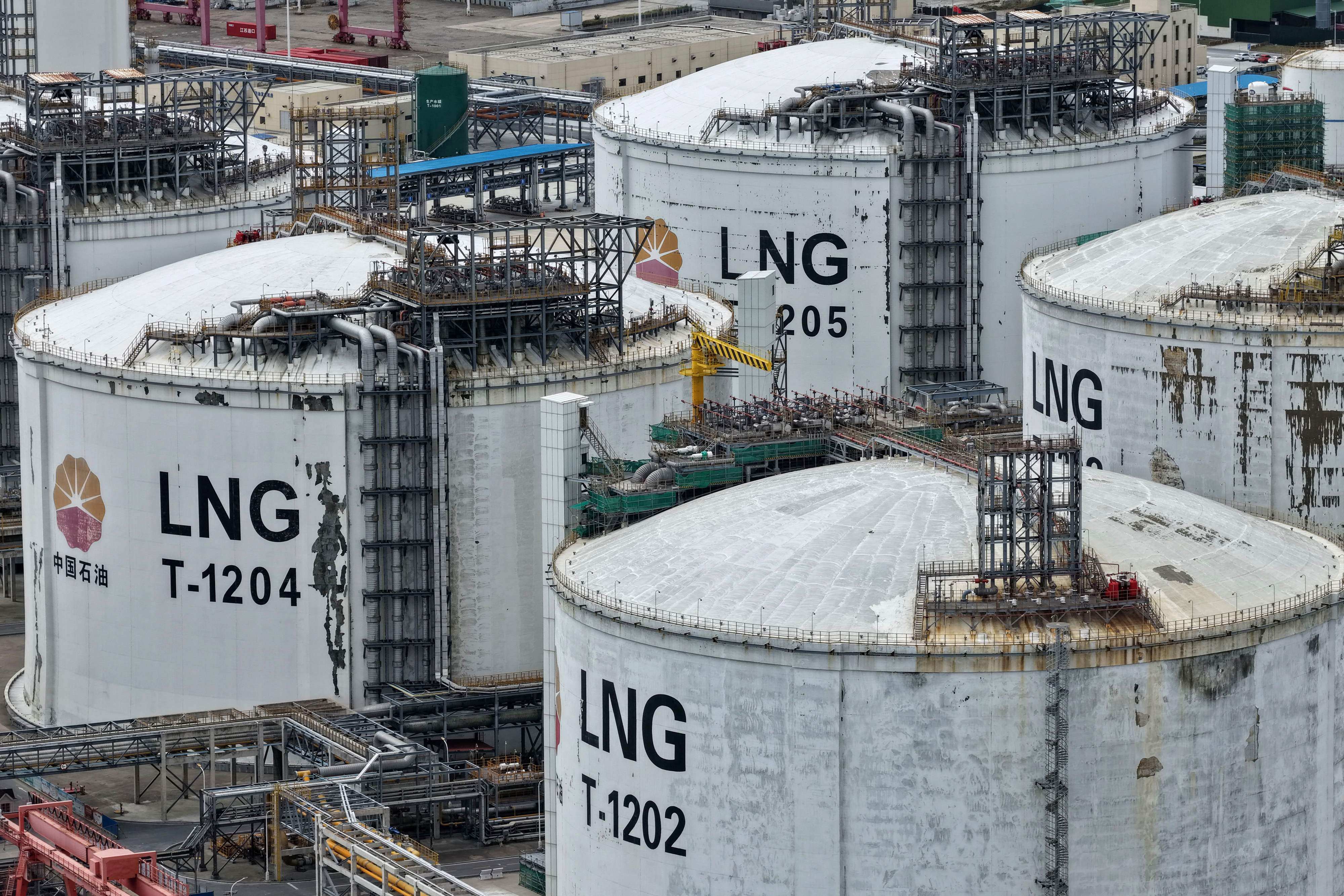 LNG storage tanks are seen in eastern China’s Jiangsu province on October 15. Photo: AFP