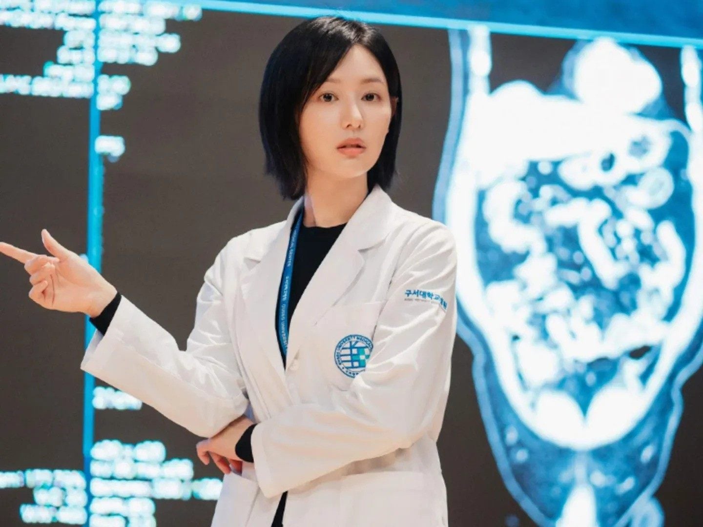 Kim Ji-won stars as a genius surgeon in "Doctor X: Mafia in White". A recent episode shows flashbacks to the 1980  Gwangju Uprising after a character suffers the effects of a gunshot wound to the head sustained during the movement. Photo: Netflix