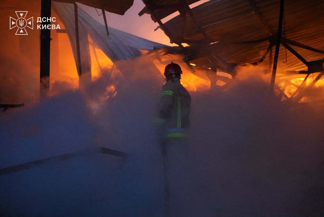 A firefighter extinguishing a fire in a damaged building following an air strike on Kyiv, amid the Russian invasion of Ukraine. Photo: AFP/State Emergency Service of Ukraine