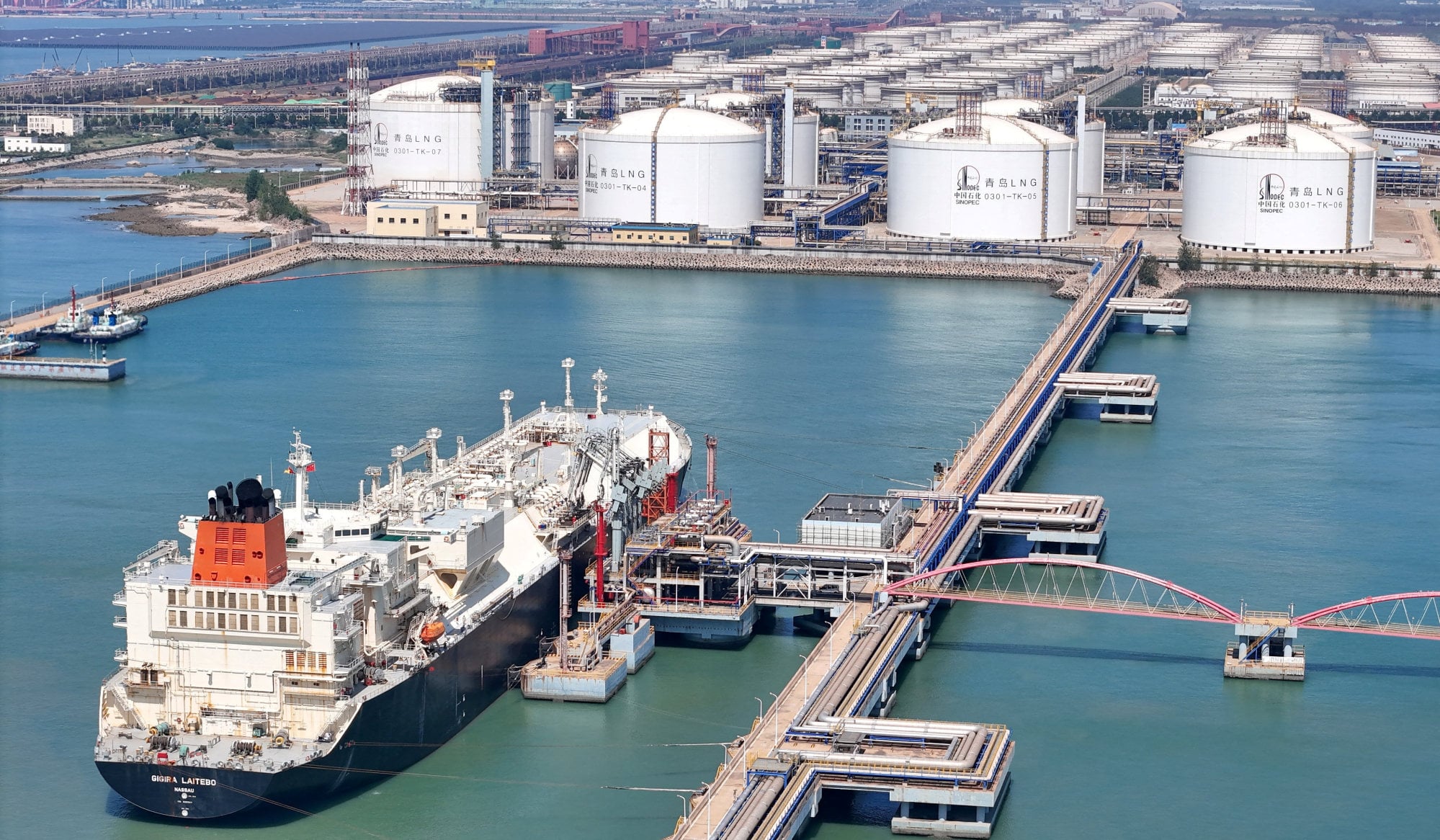 An LNG tanker unloads at a terminal in Qingdao, Shandong province. Photo: Reuters An LNG tanker unloads at a terminal in Qingdao, Shandong province. Photo: Reuters